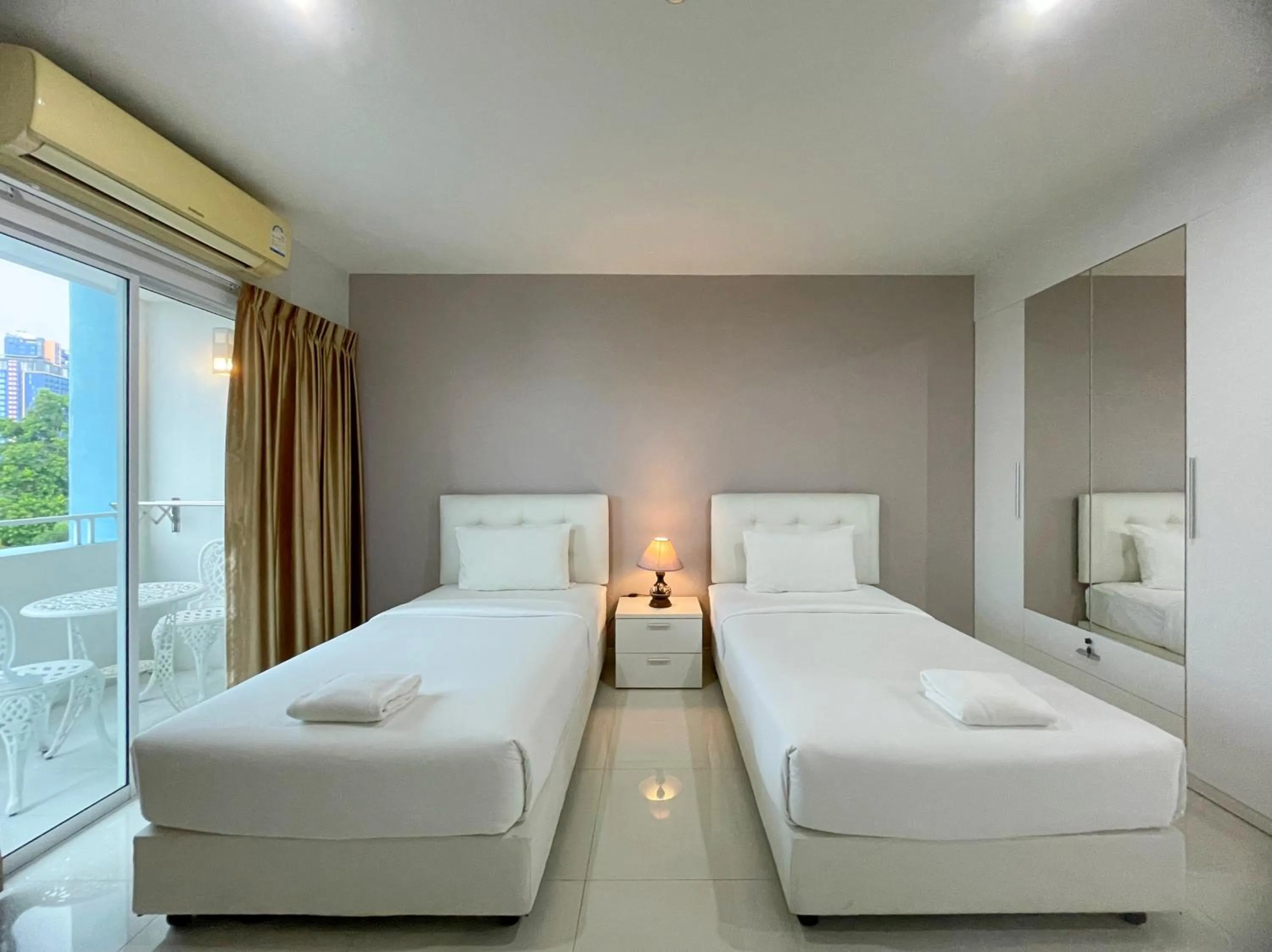 Bed in Baan Pattaya by Sabai