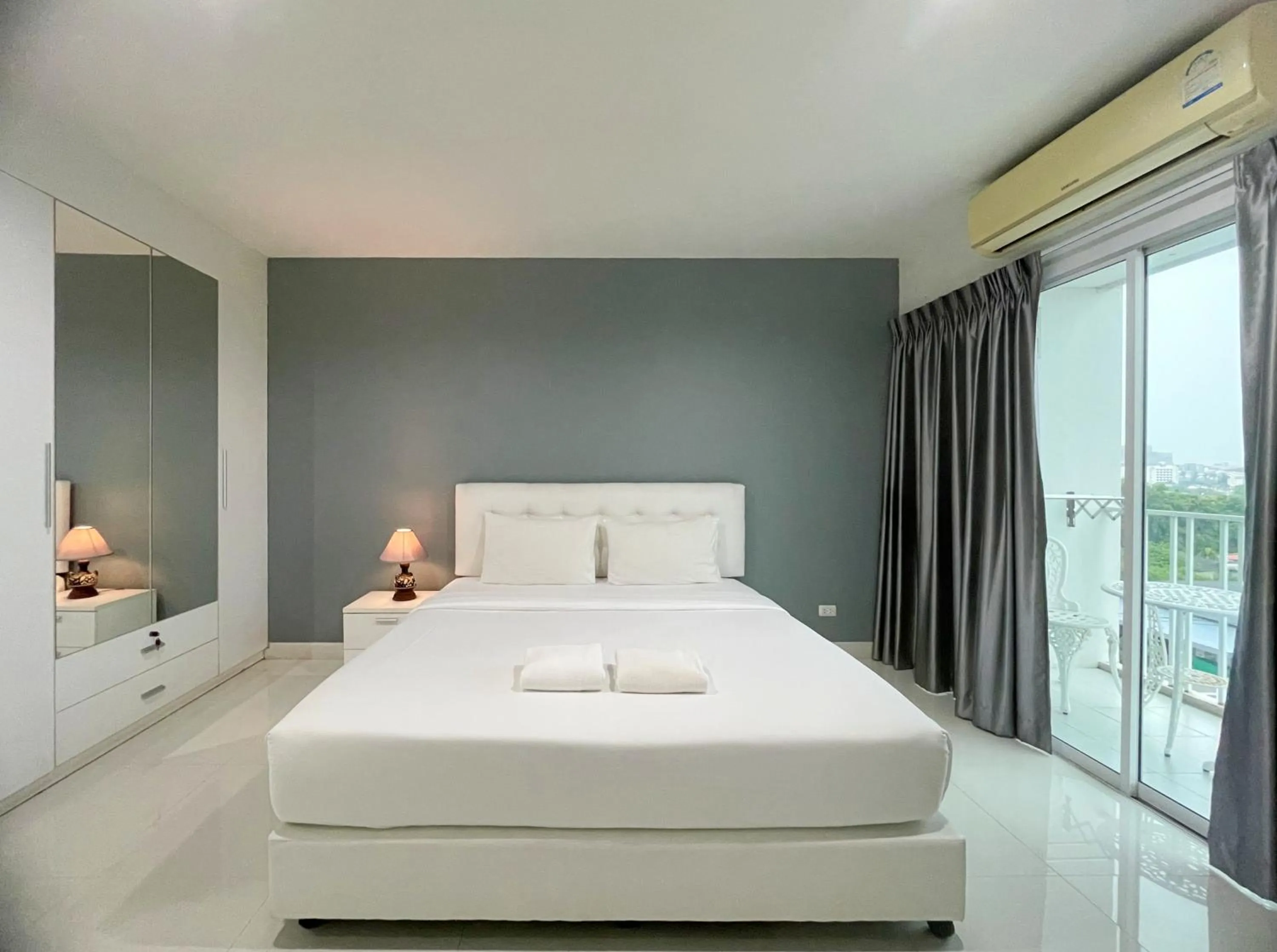 Bed in Baan Pattaya by Sabai