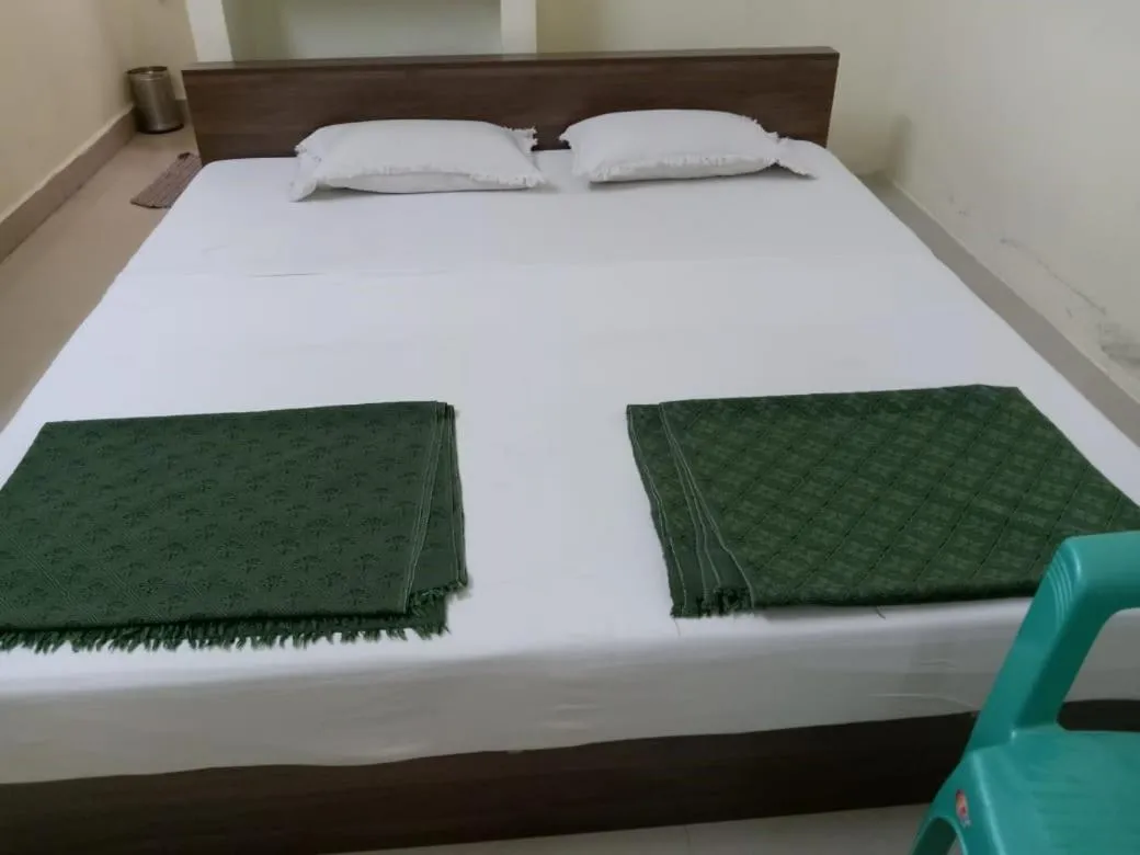 Bed in BSSK Comforts Inn