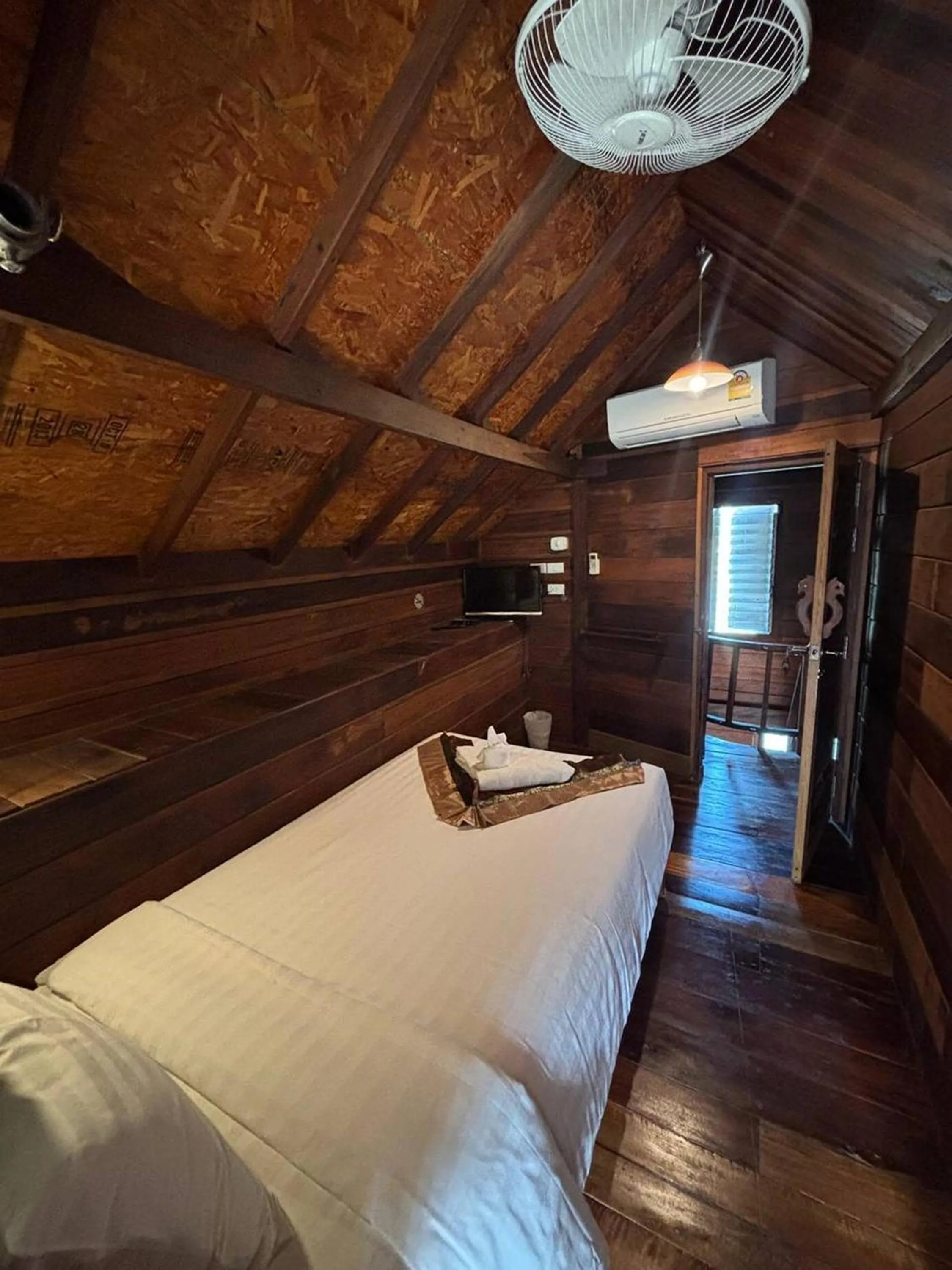 Bed in Boutique Village Hotel