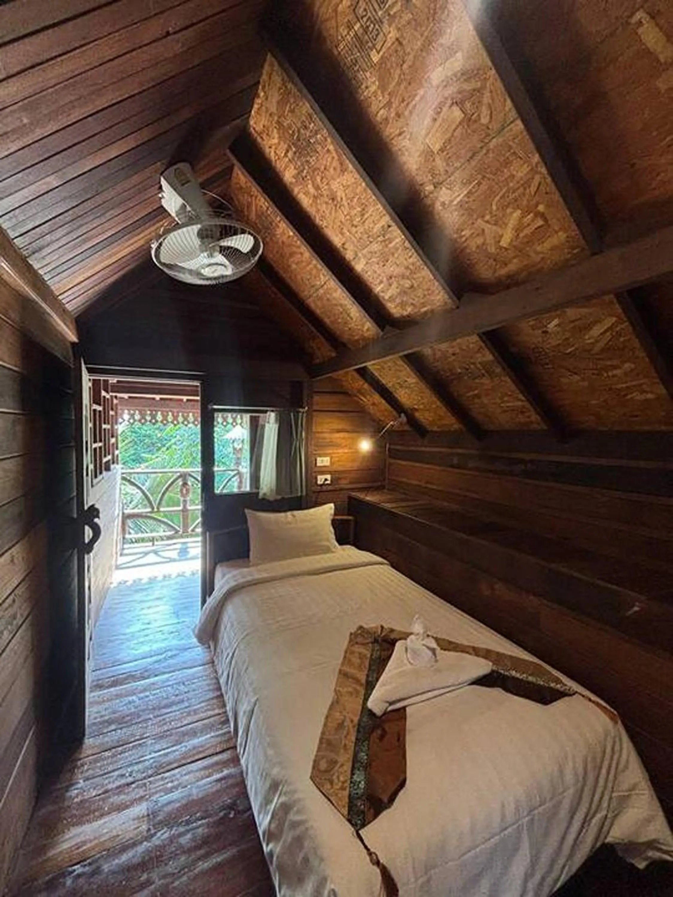 Bed in Boutique Village Hotel