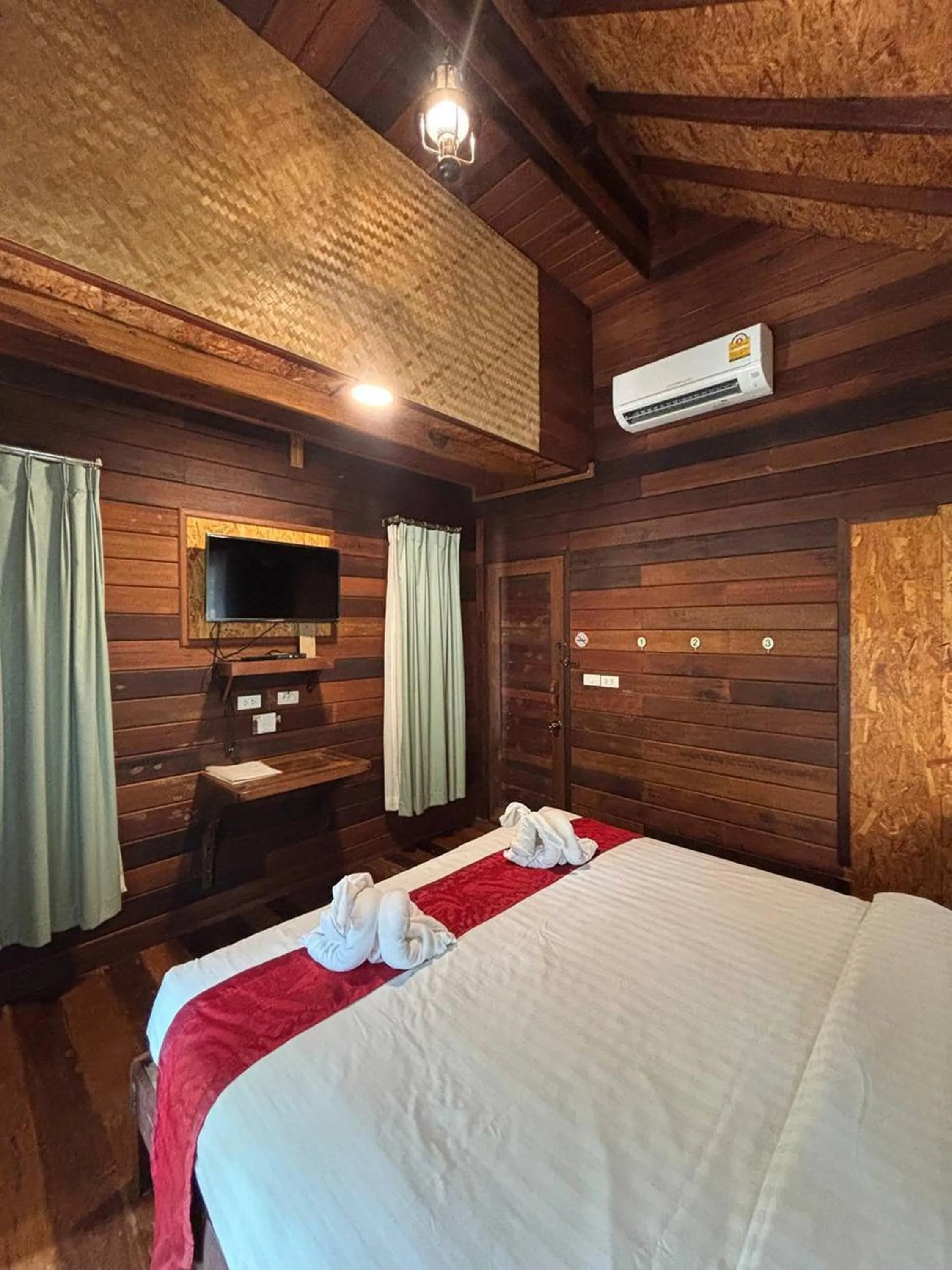 Bed in Boutique Village Hotel