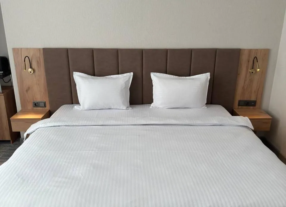 Bed in Reikartz Hanzade Samarkand