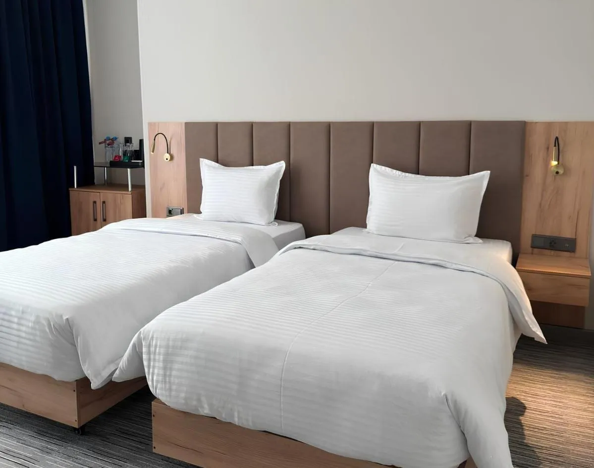 Bed in Reikartz Hanzade Samarkand