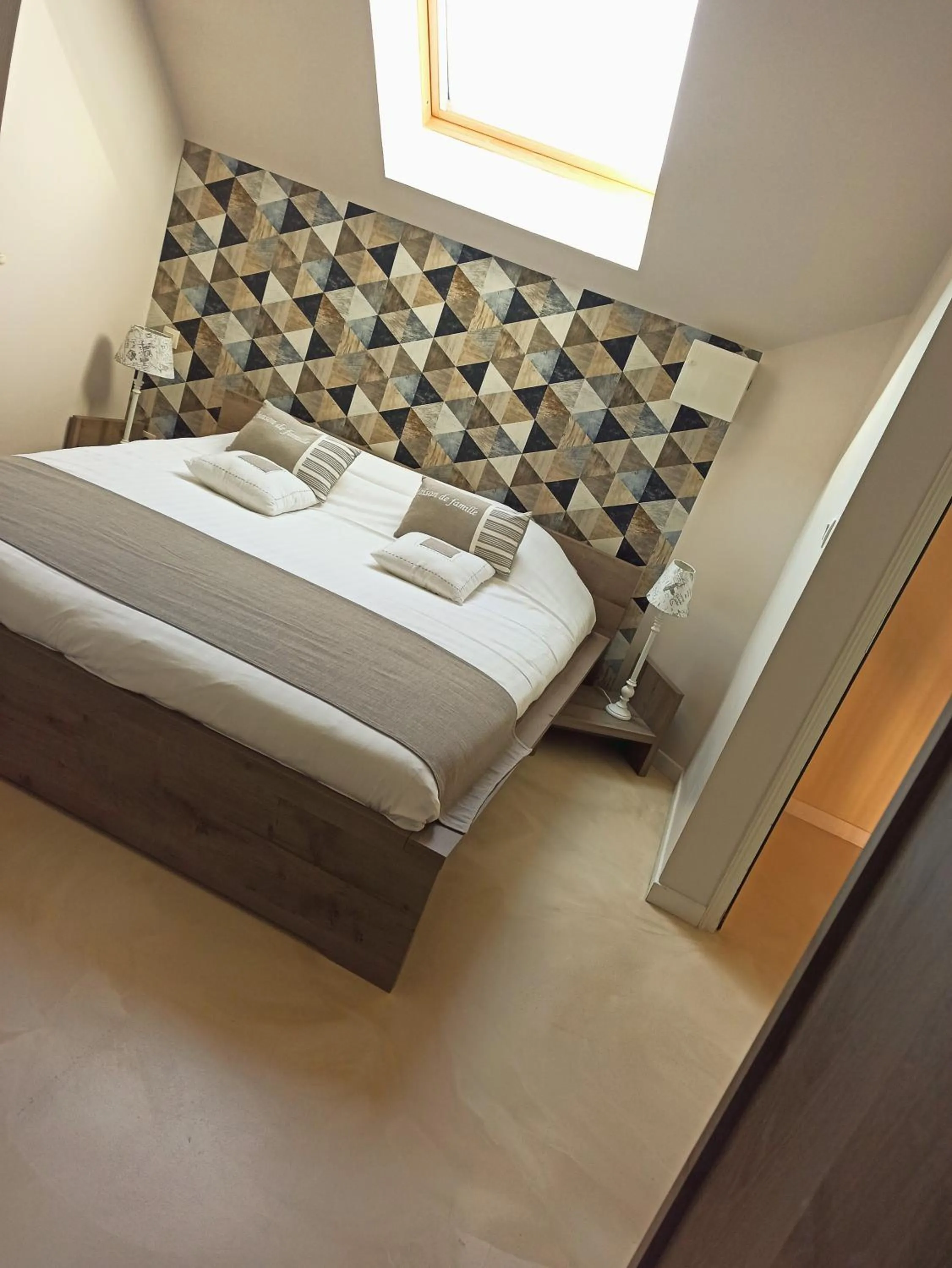 Bed in L'Heure Bleue gîtes et chambres d'hôtes