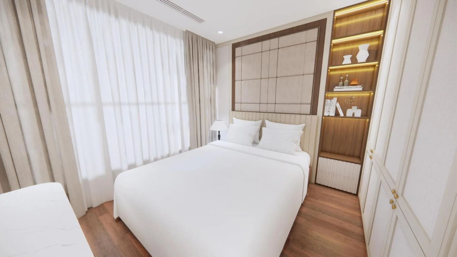 Bed in Aravelle Suites