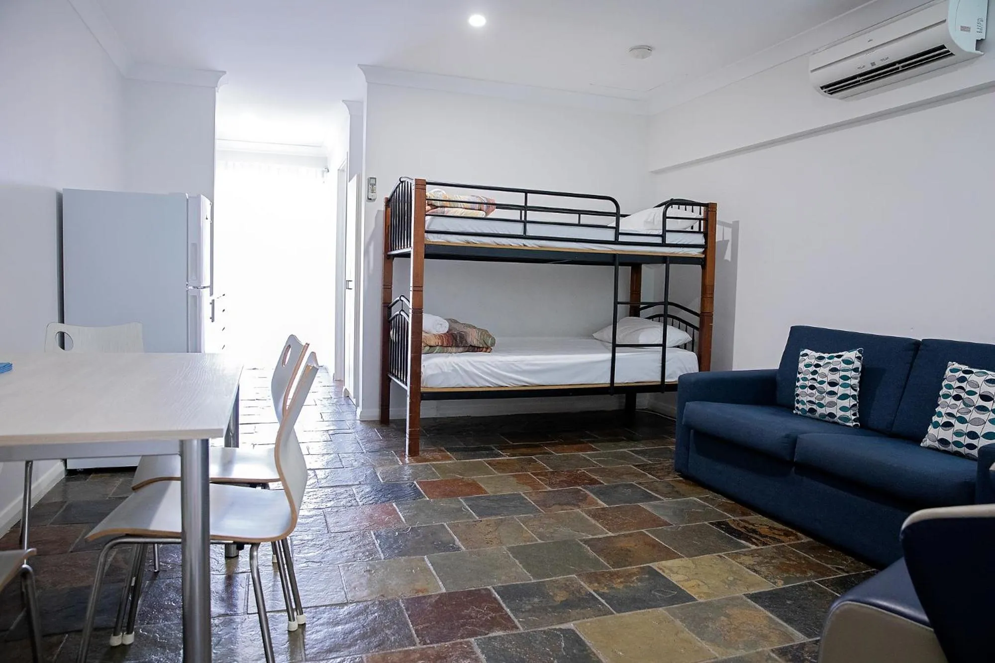 Dining area, Bed in Busselton Villas and Glamping Village