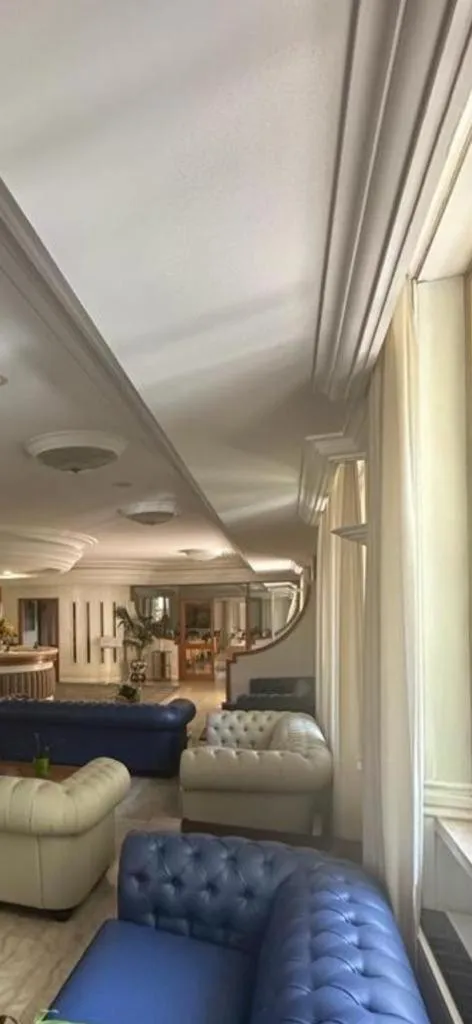 Living room in Mondial Park Hotel