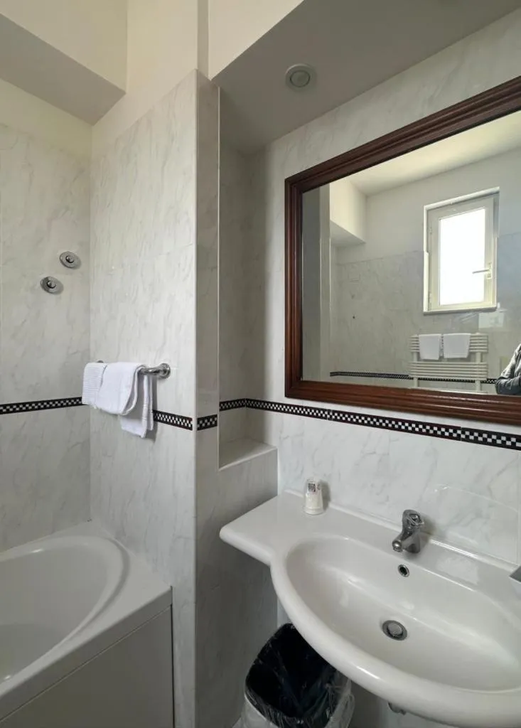 Bathroom in Mondial Park Hotel