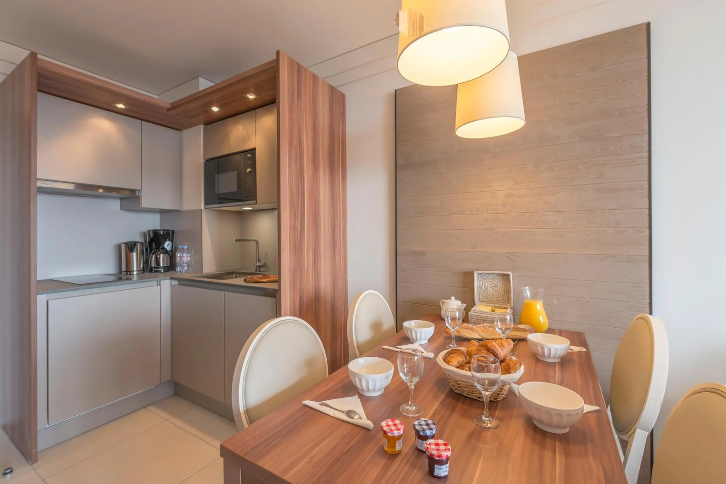 Kitchen or kitchenette in Hôtel Eden by Odalys