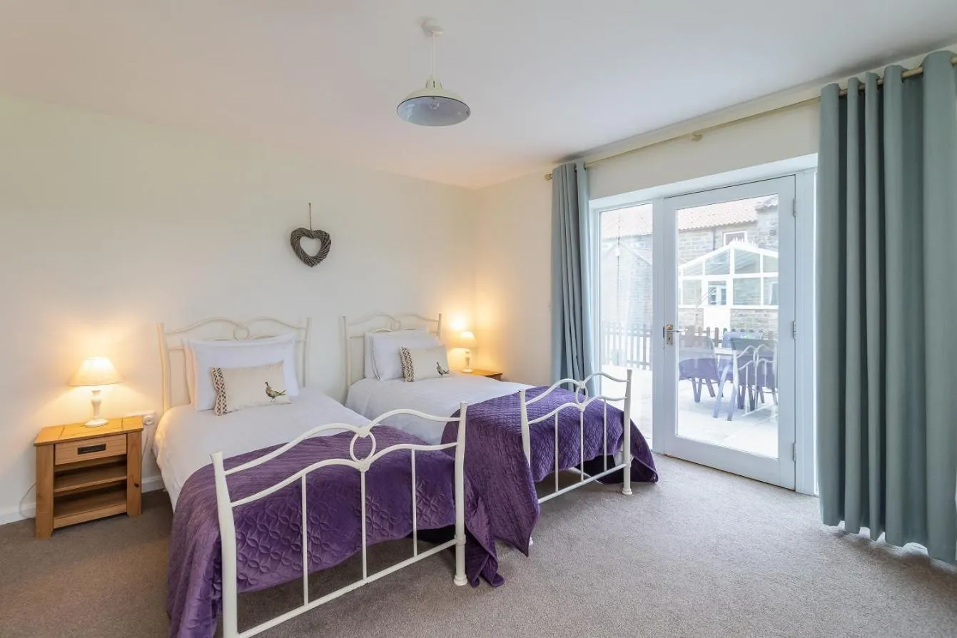 Bed in The Grainary Cottages