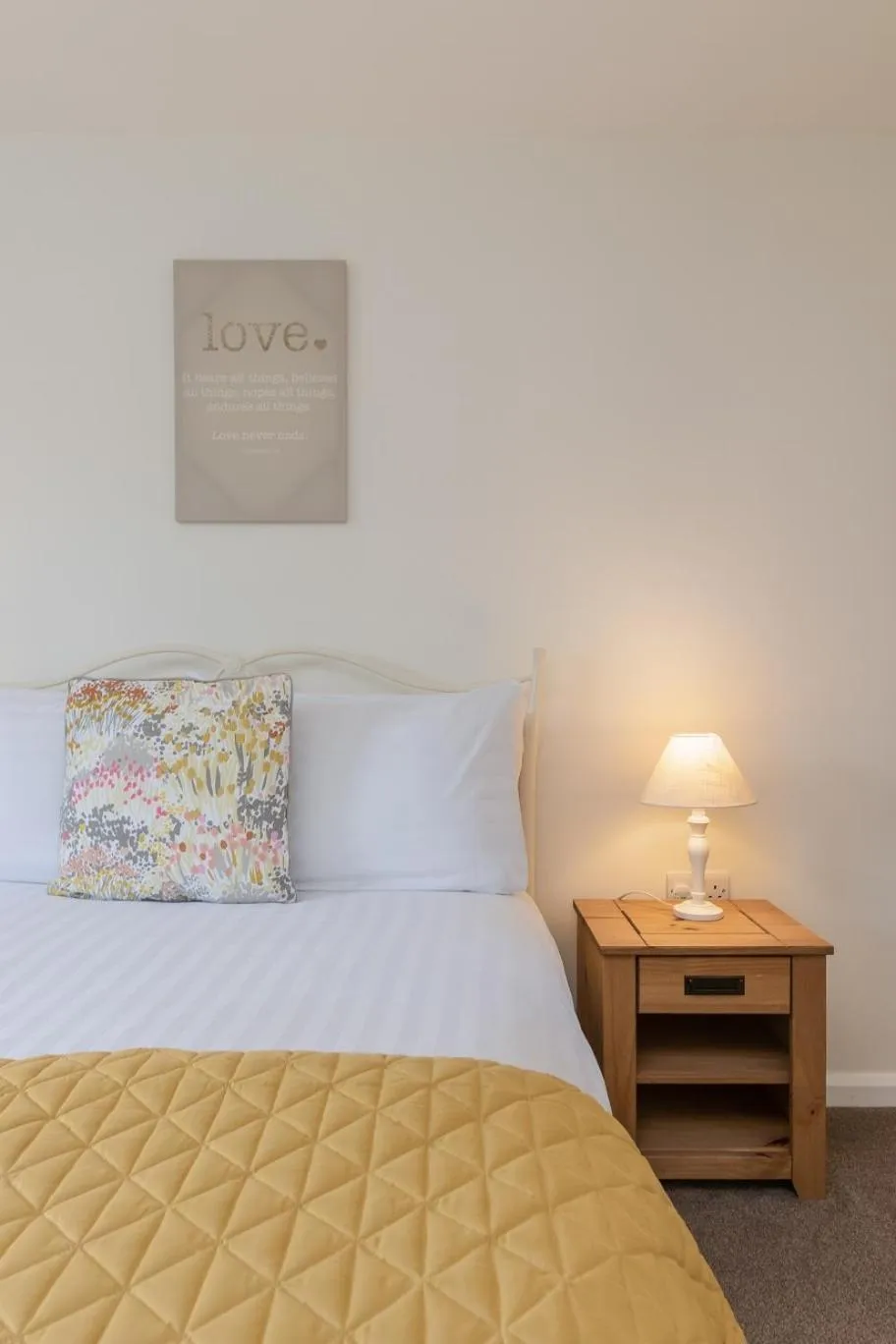 Bed in The Grainary Cottages