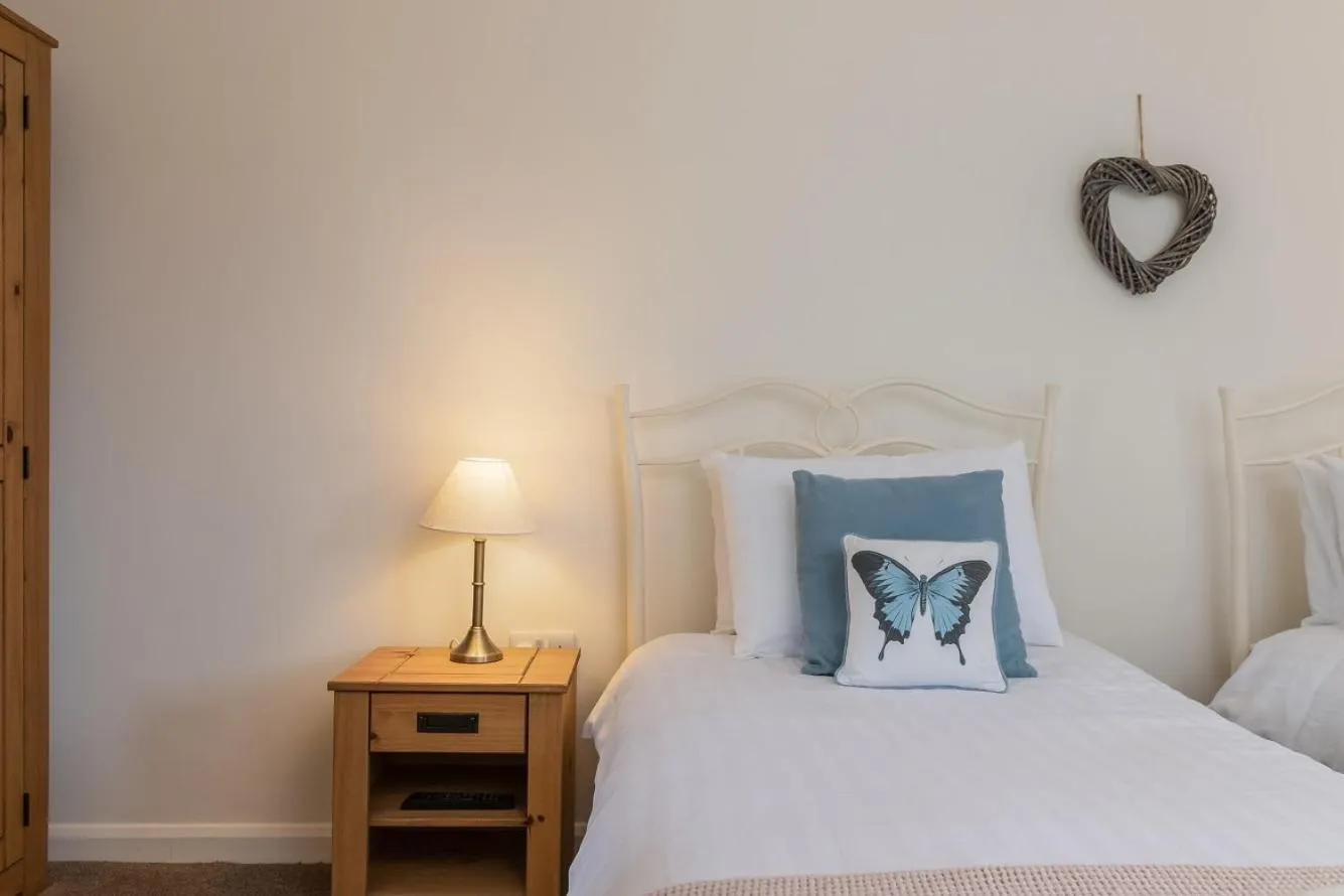 Bed in The Grainary Cottages