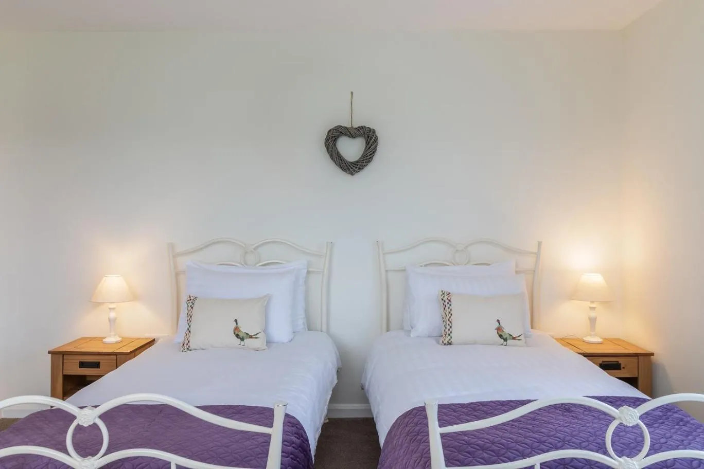 Bed in The Grainary Cottages