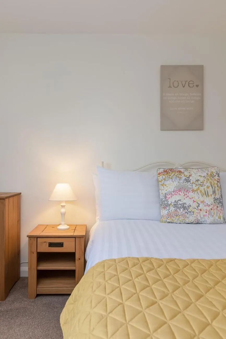 Bed in The Grainary Cottages