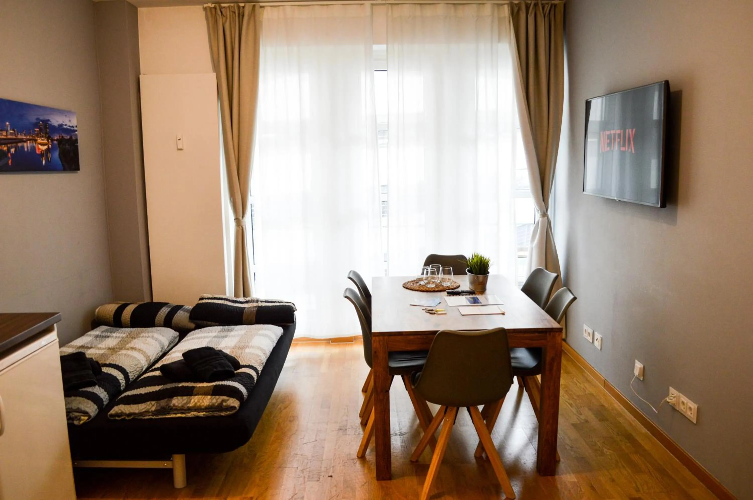 TV and multimedia, Bed in Centerapartments Tonhallenstraße