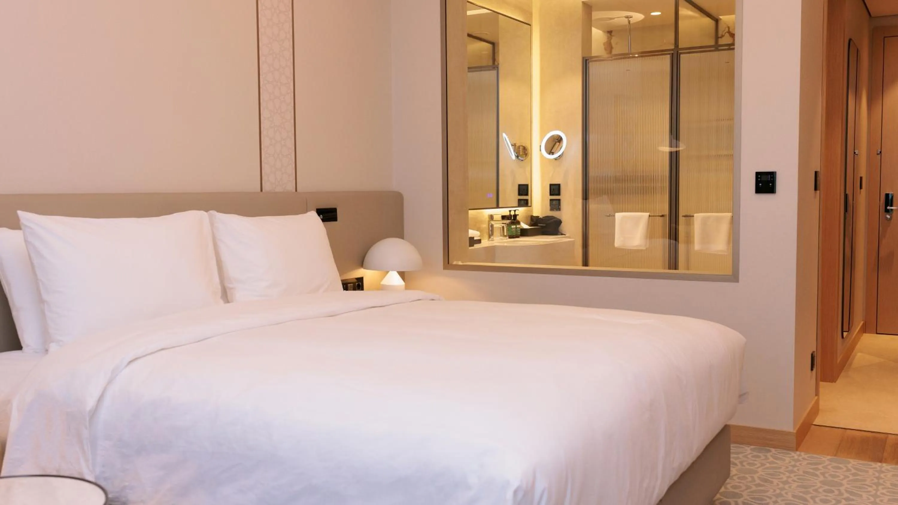 Photo of the whole room, Bed in Crowne Plaza Dushanbe by IHG