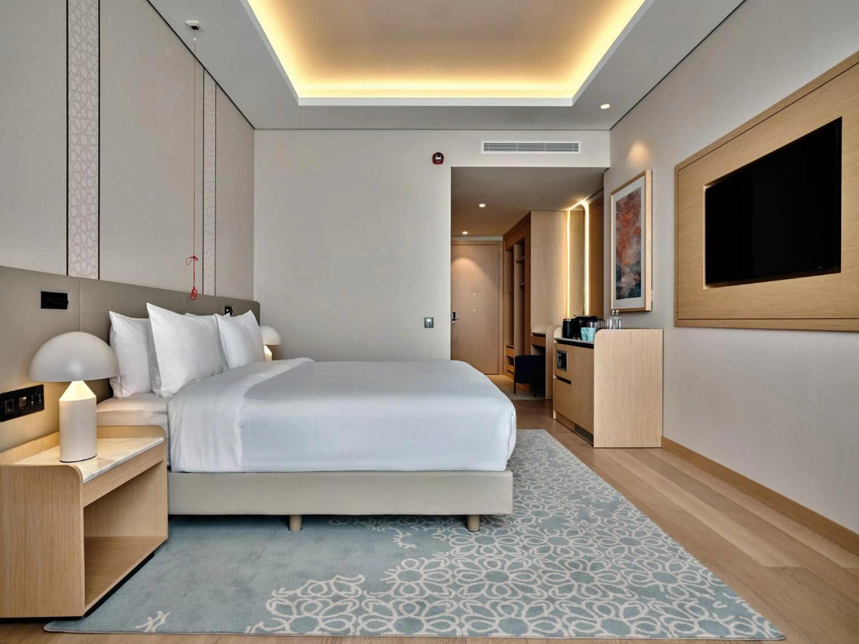 Photo of the whole room, Bed in Crowne Plaza Dushanbe by IHG