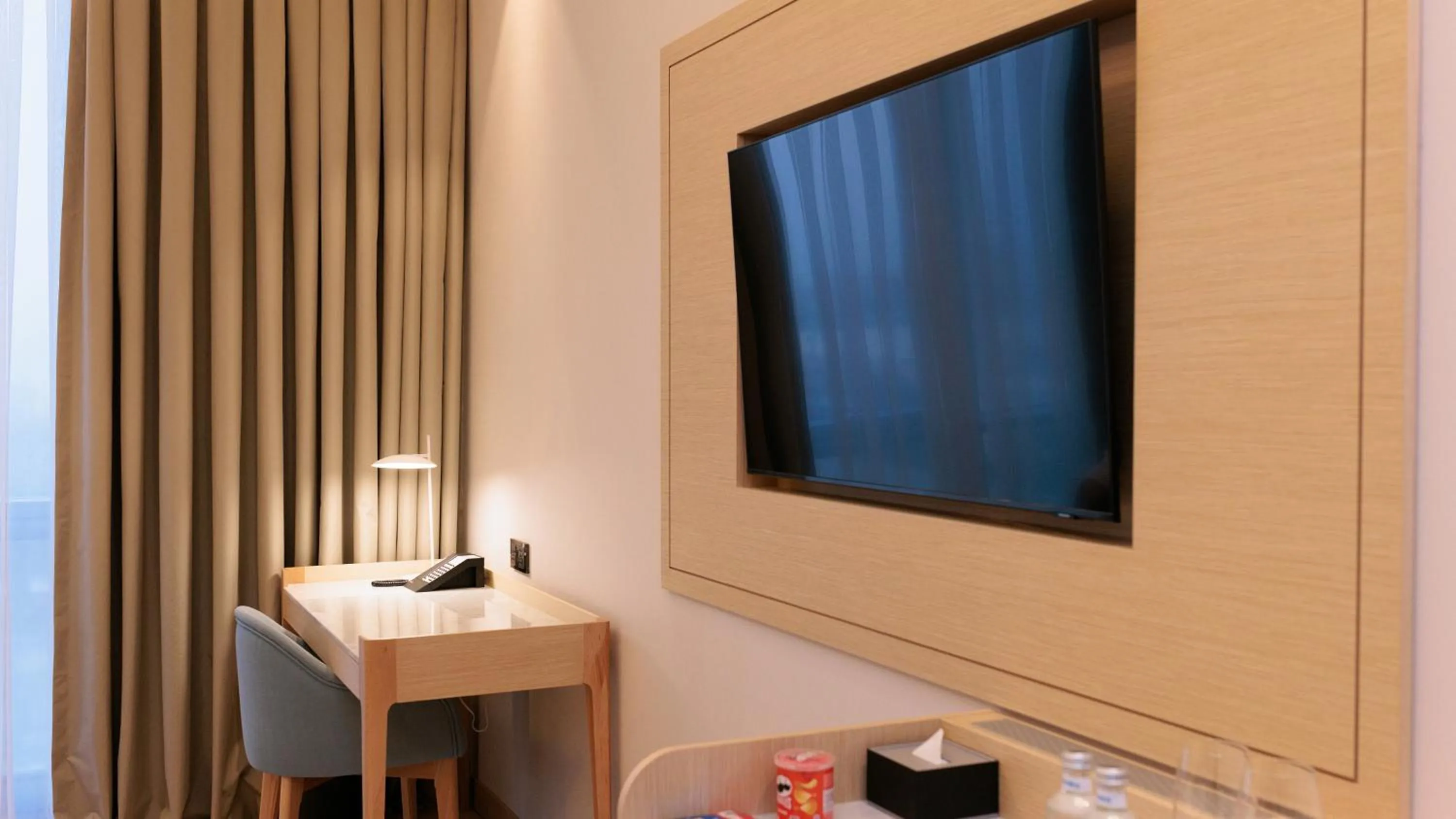 TV and multimedia in Crowne Plaza Dushanbe by IHG