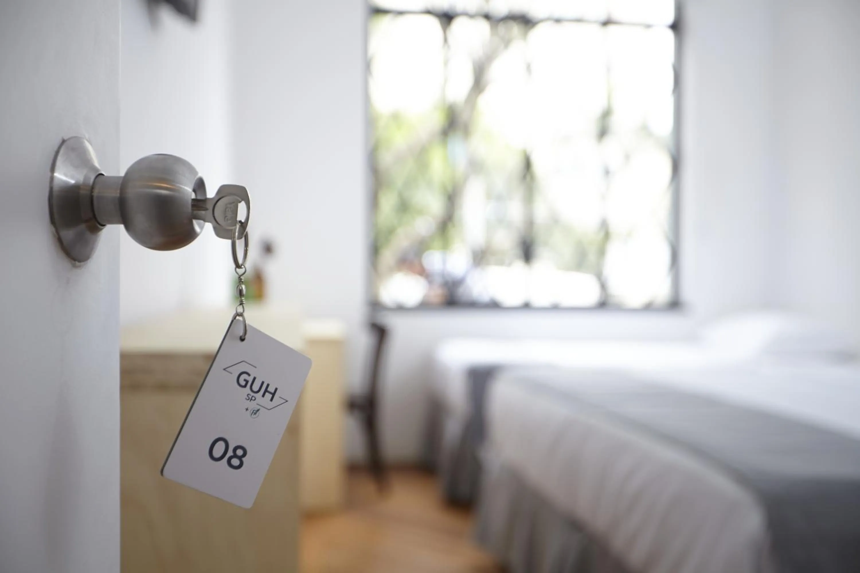 Bedroom, Bed in Guest Urban Hotel Design Pinheiros