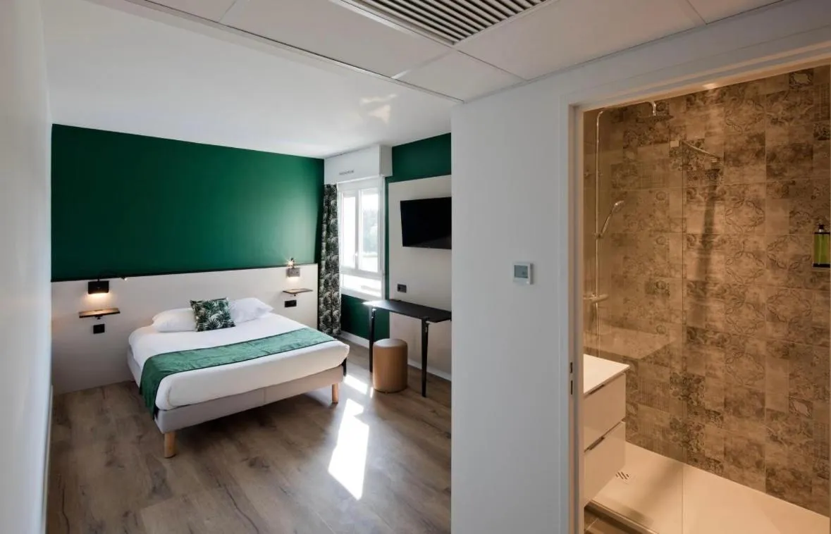 Bed in Hôtel Le Riccoty