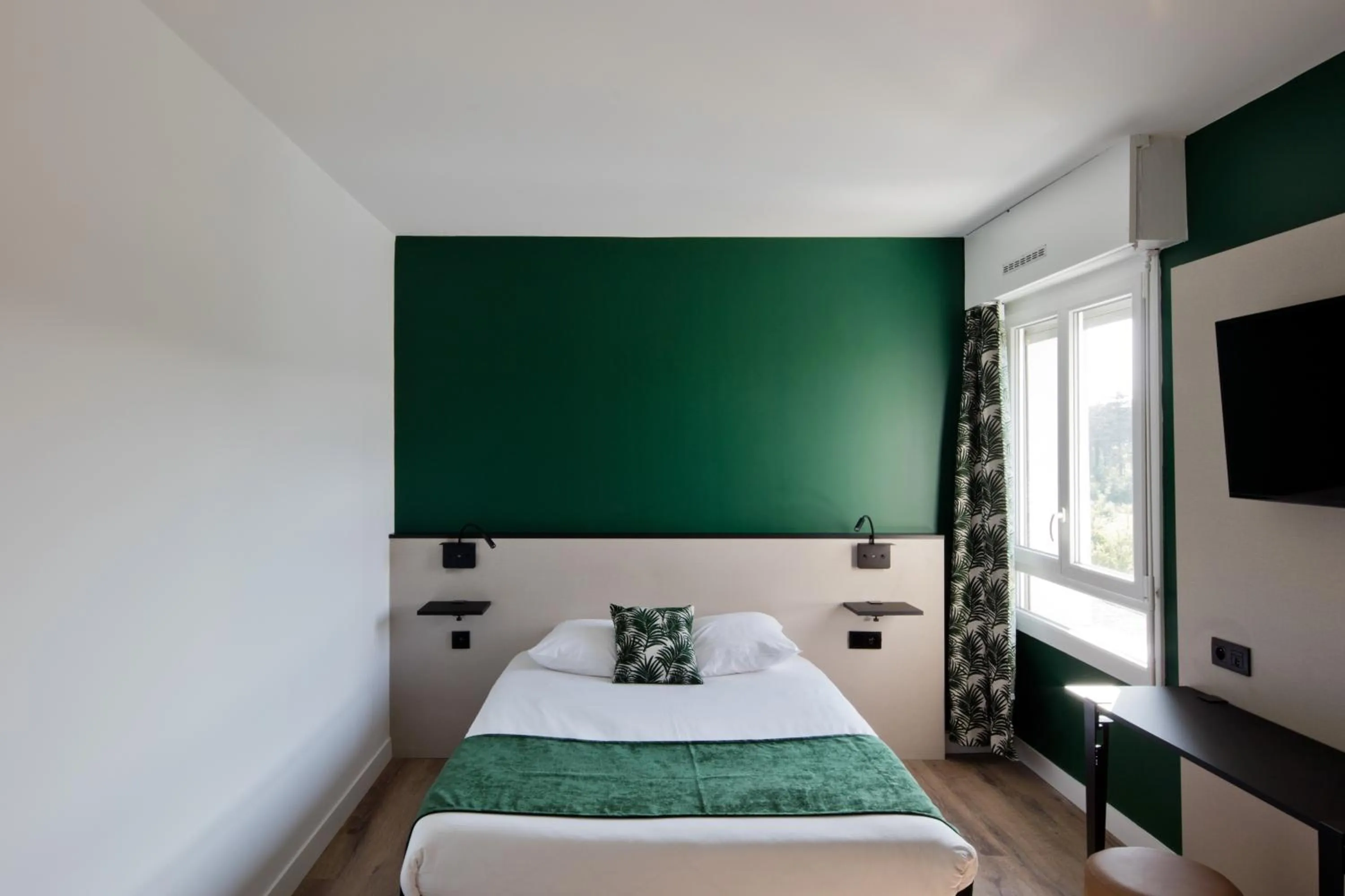 Bed in Hôtel Le Riccoty