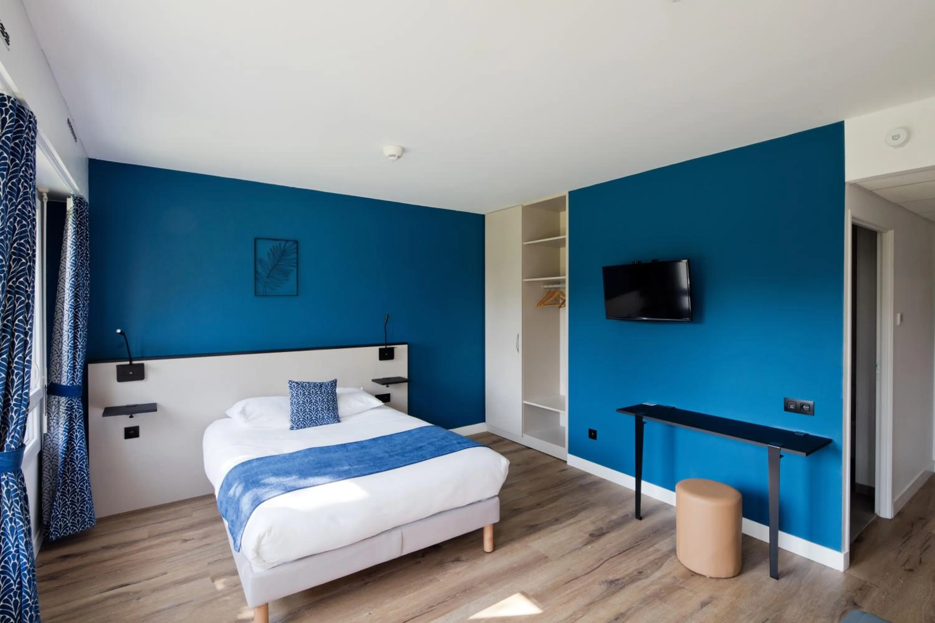 Bed in Hôtel Le Riccoty