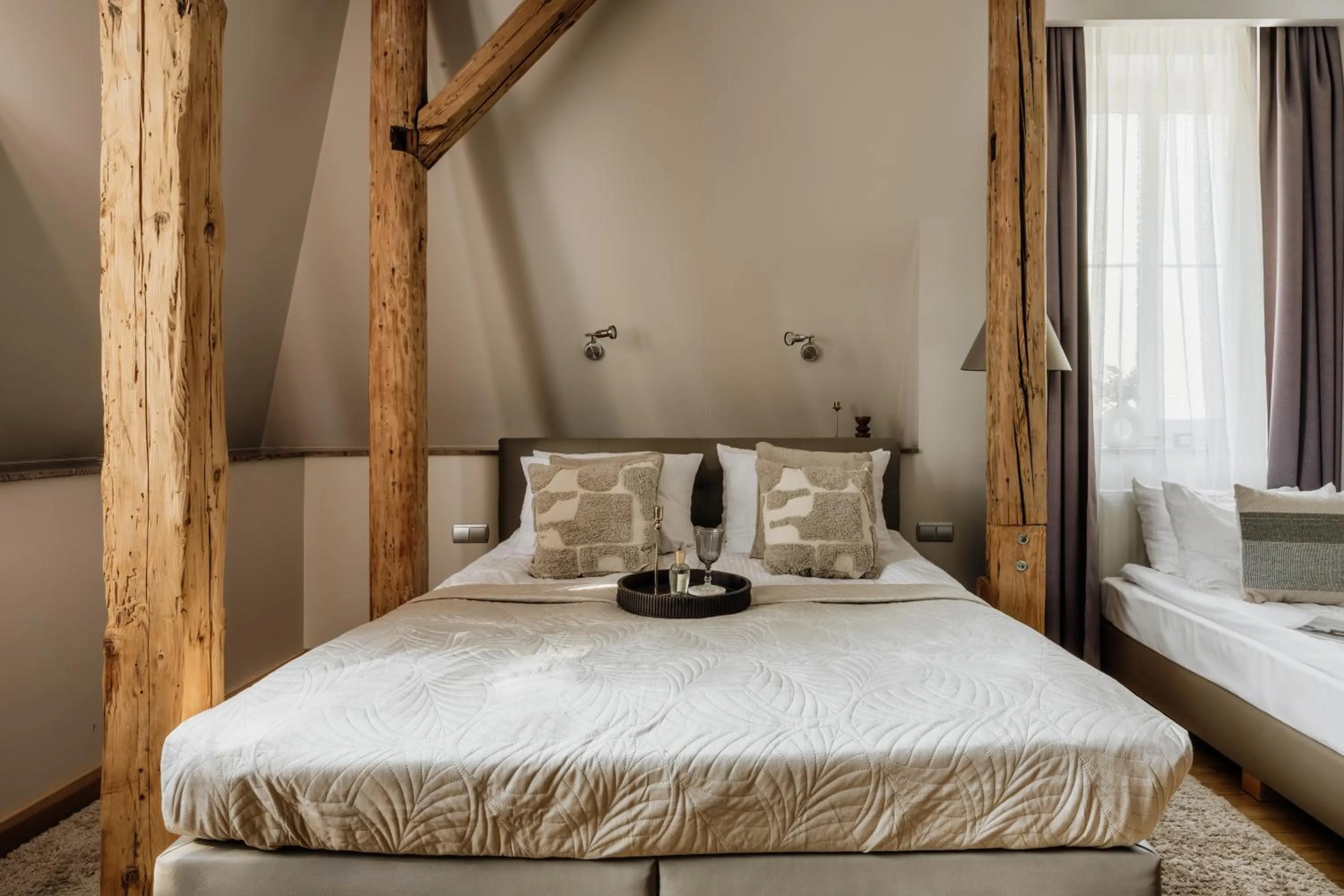 Bed in Grottger Luxury Boutique Hotel City