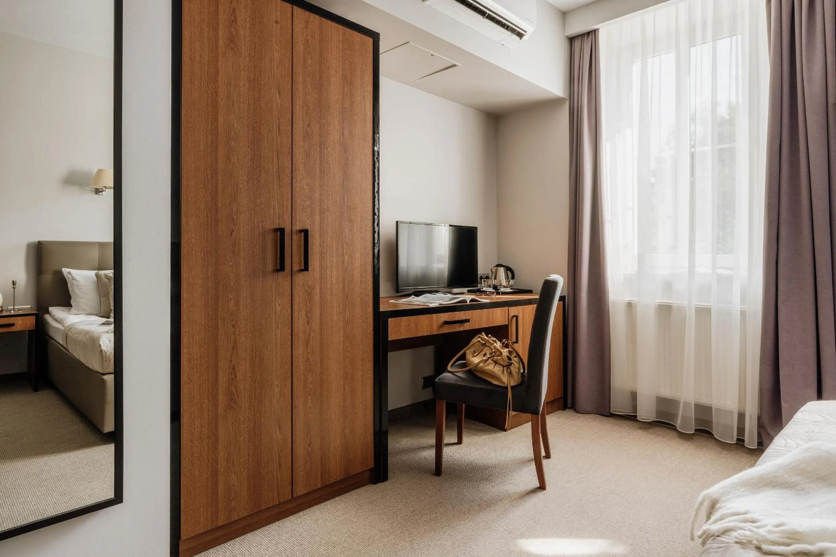 Bed in Grottger Luxury Boutique Hotel City