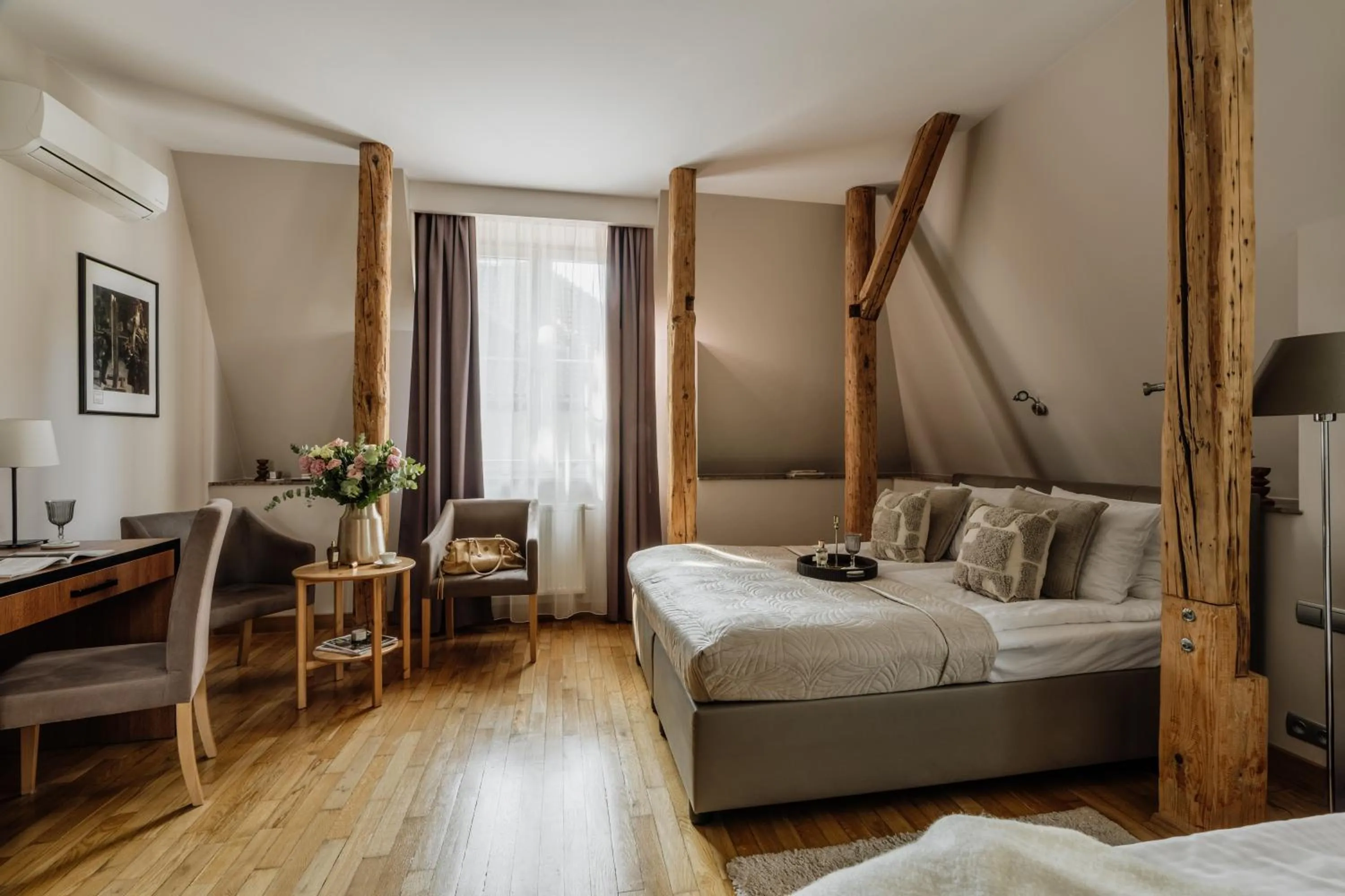 Bed in Grottger Luxury Boutique Hotel City