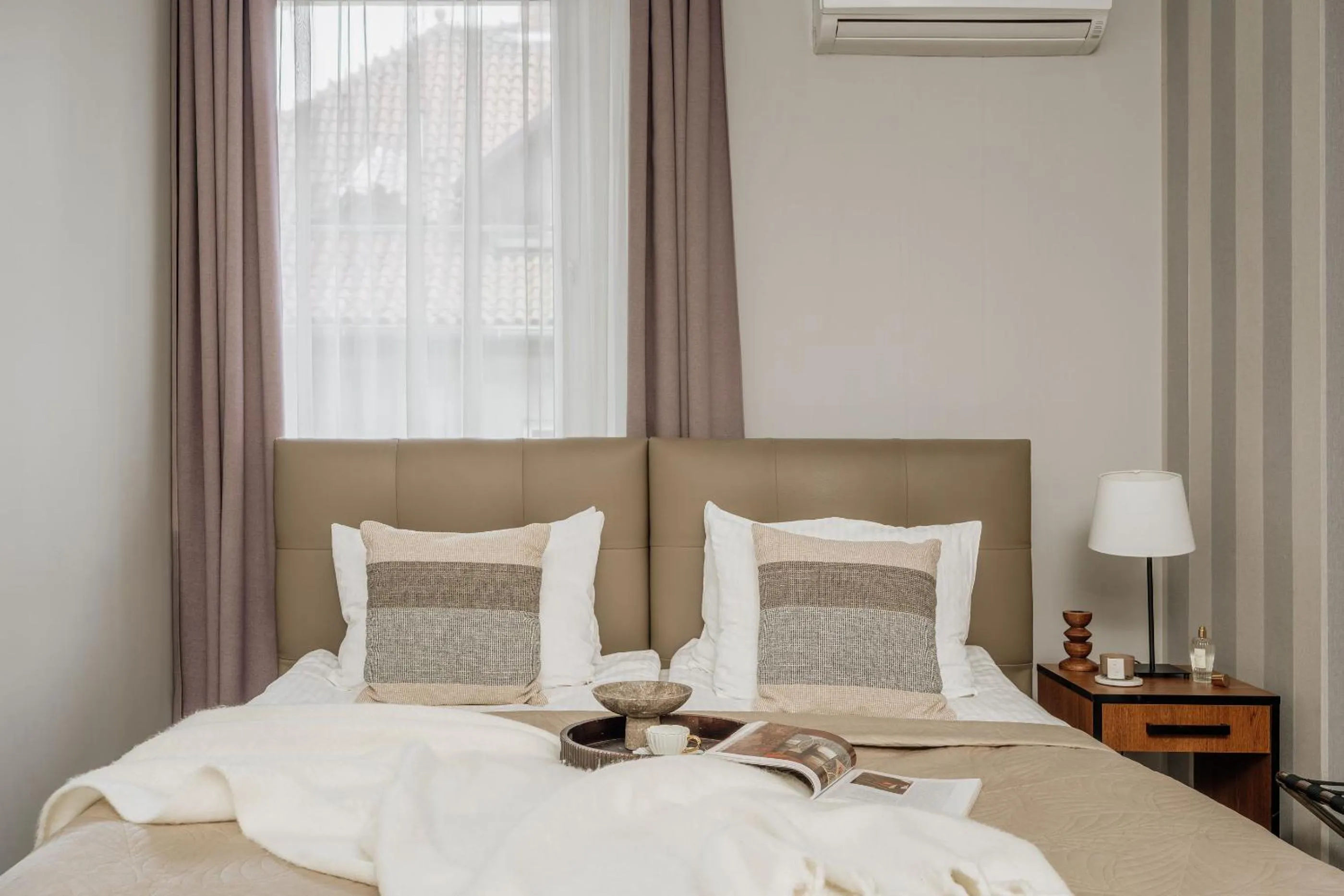 Bed in Grottger Luxury Boutique Hotel City