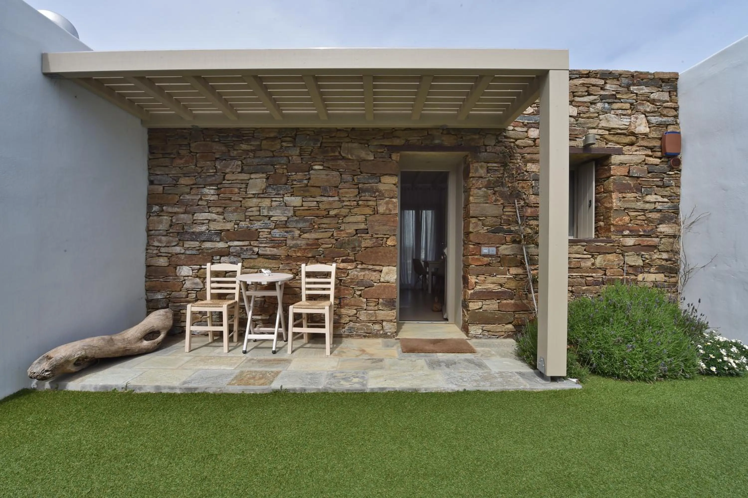 Facade/entrance in White Tinos Luxury Suites