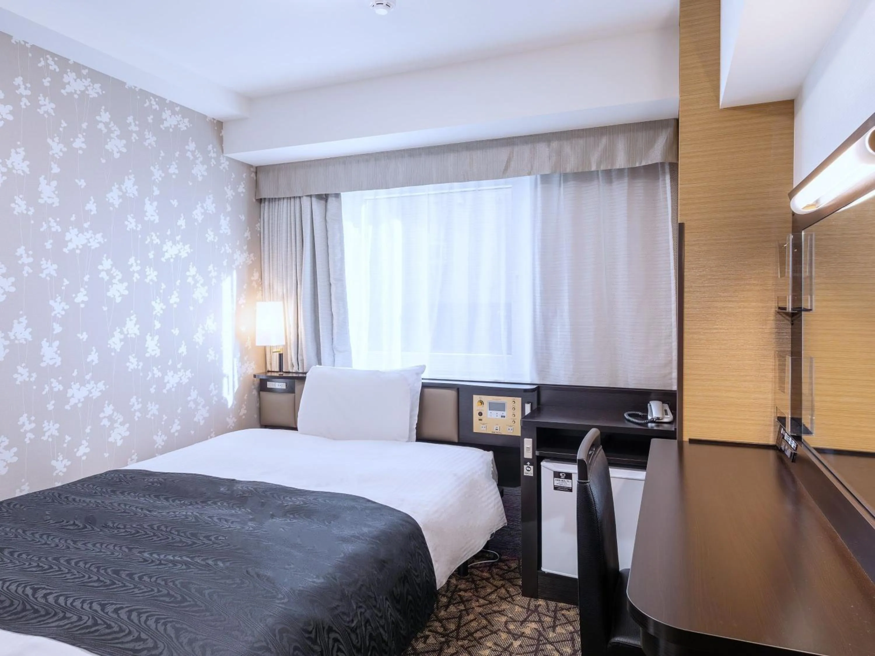 Photo of the whole room, Bed in APA Hotel Sapporo Odori Ekimae Nishi