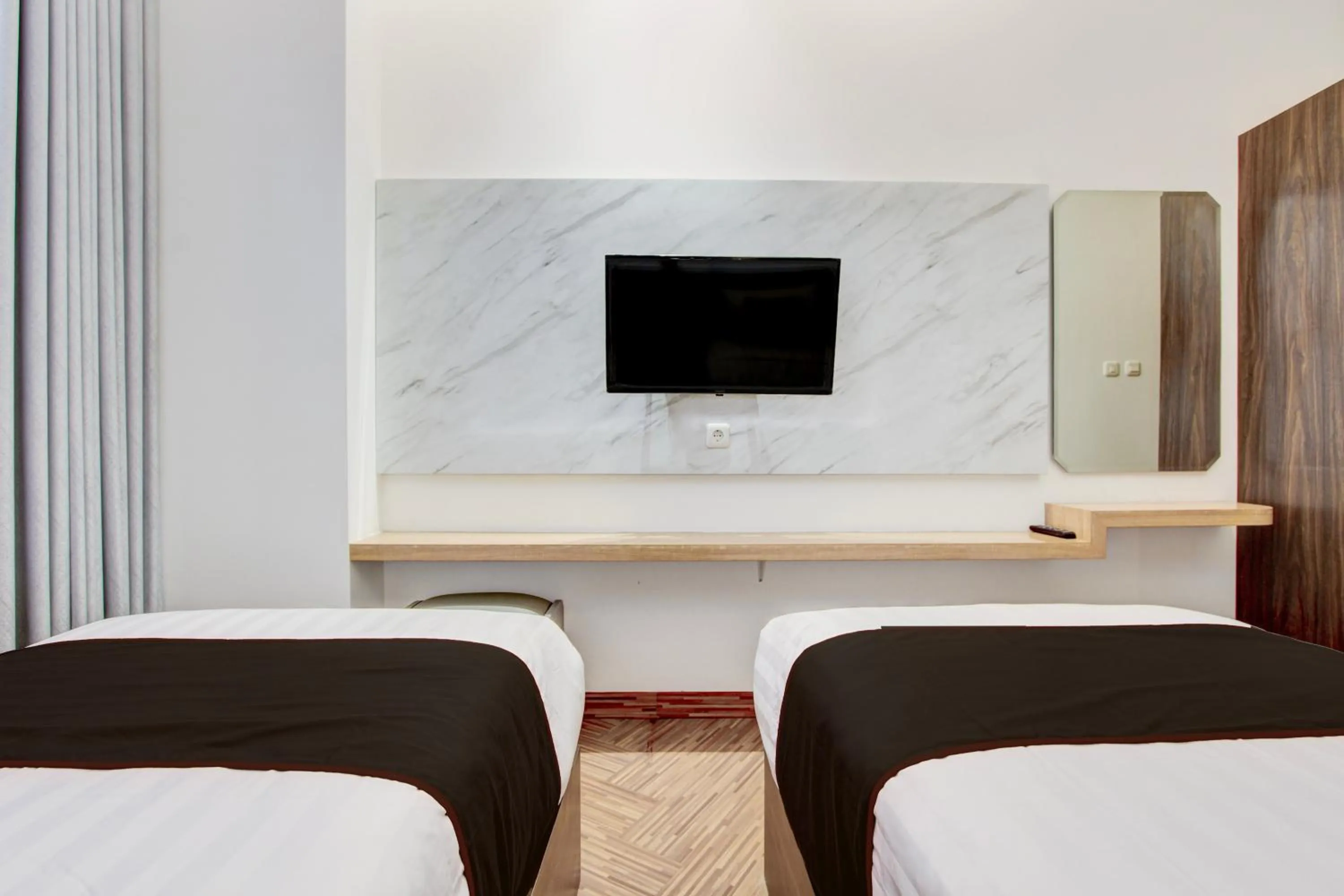 Bedroom in Townhouse OAK Near The Park Mall Semarang Formerly Semarang Boutique Hotel