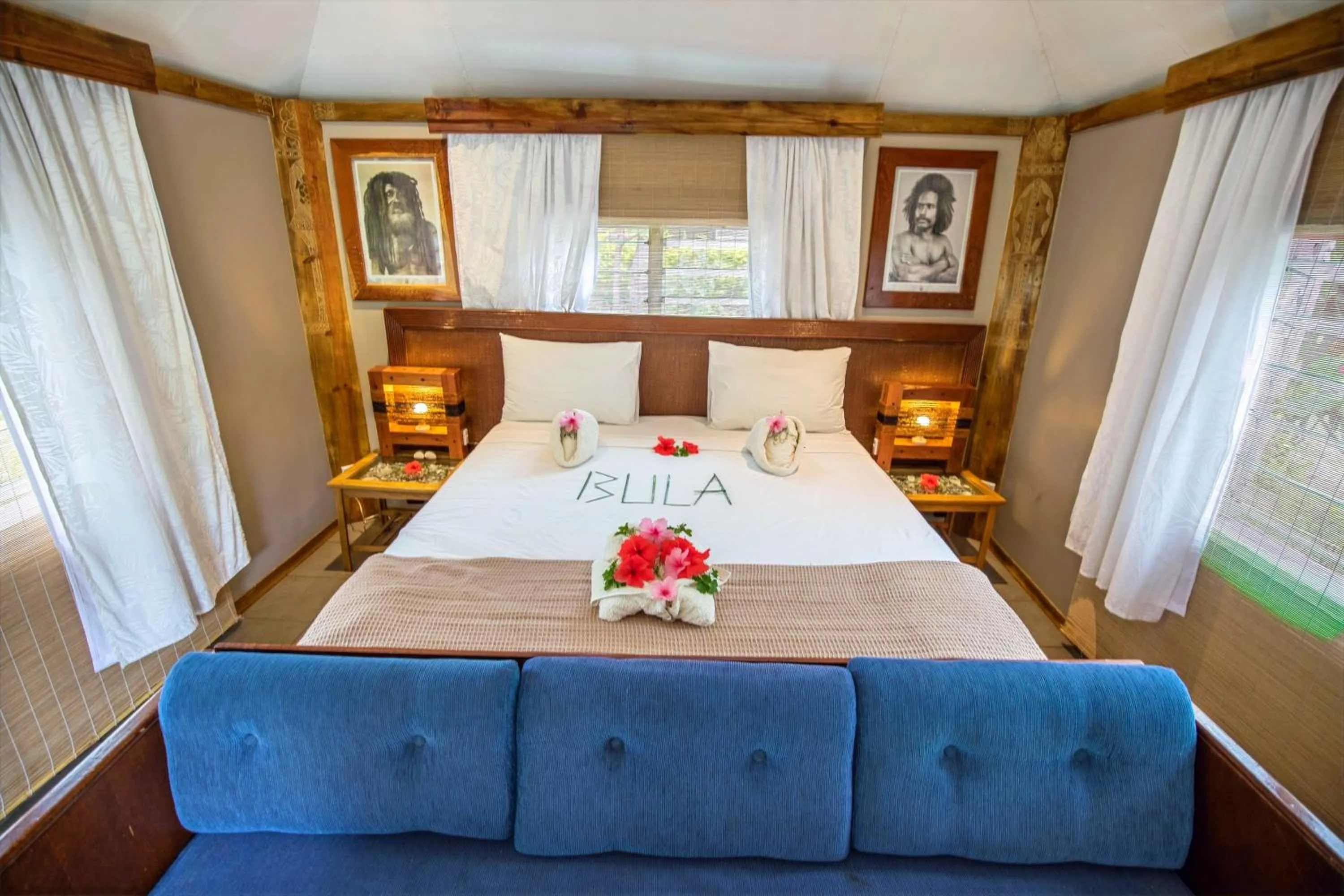 Bed in Barefoot Kuata Island Resort