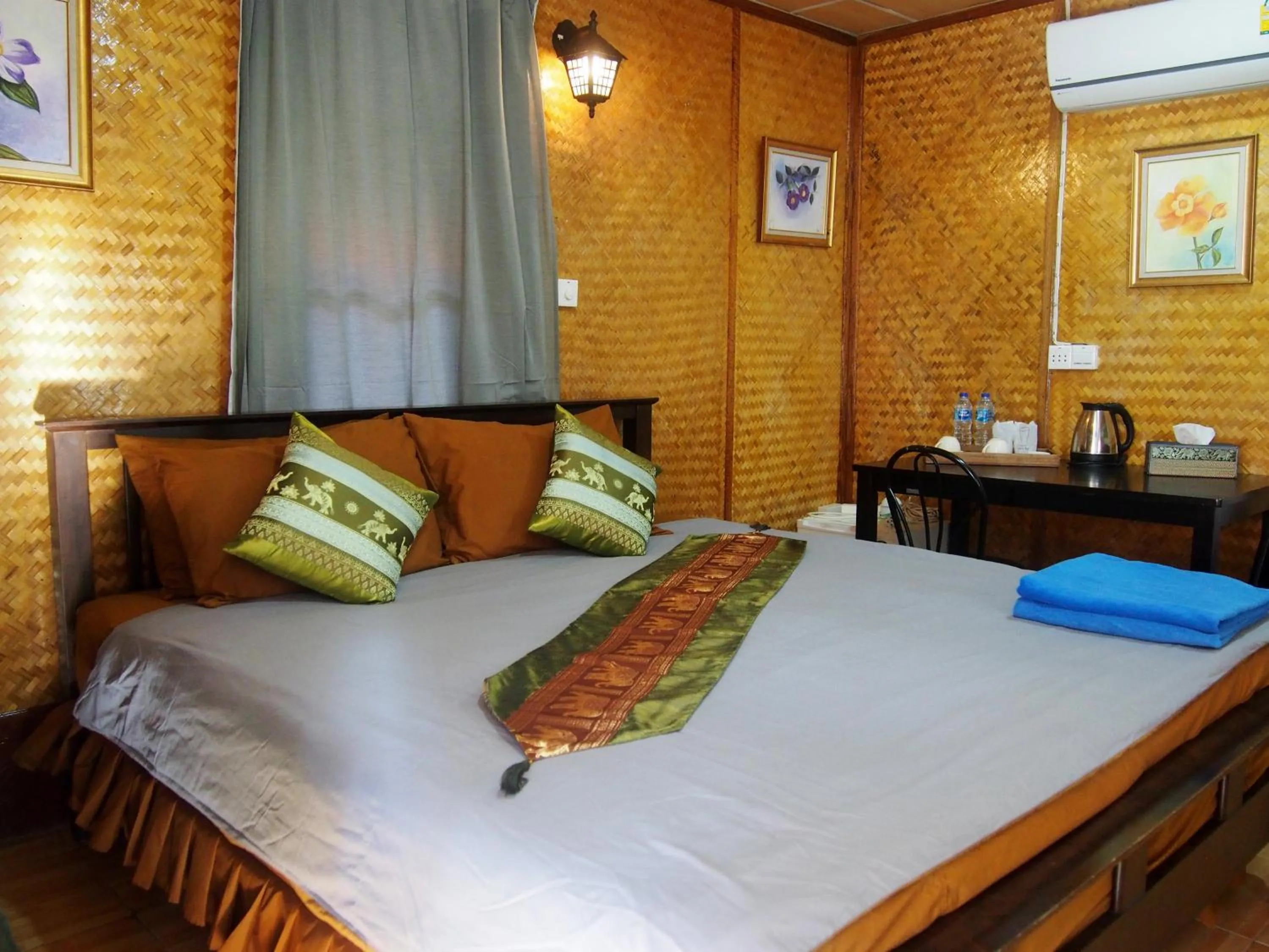 Bed in Coco Beach Bungalows