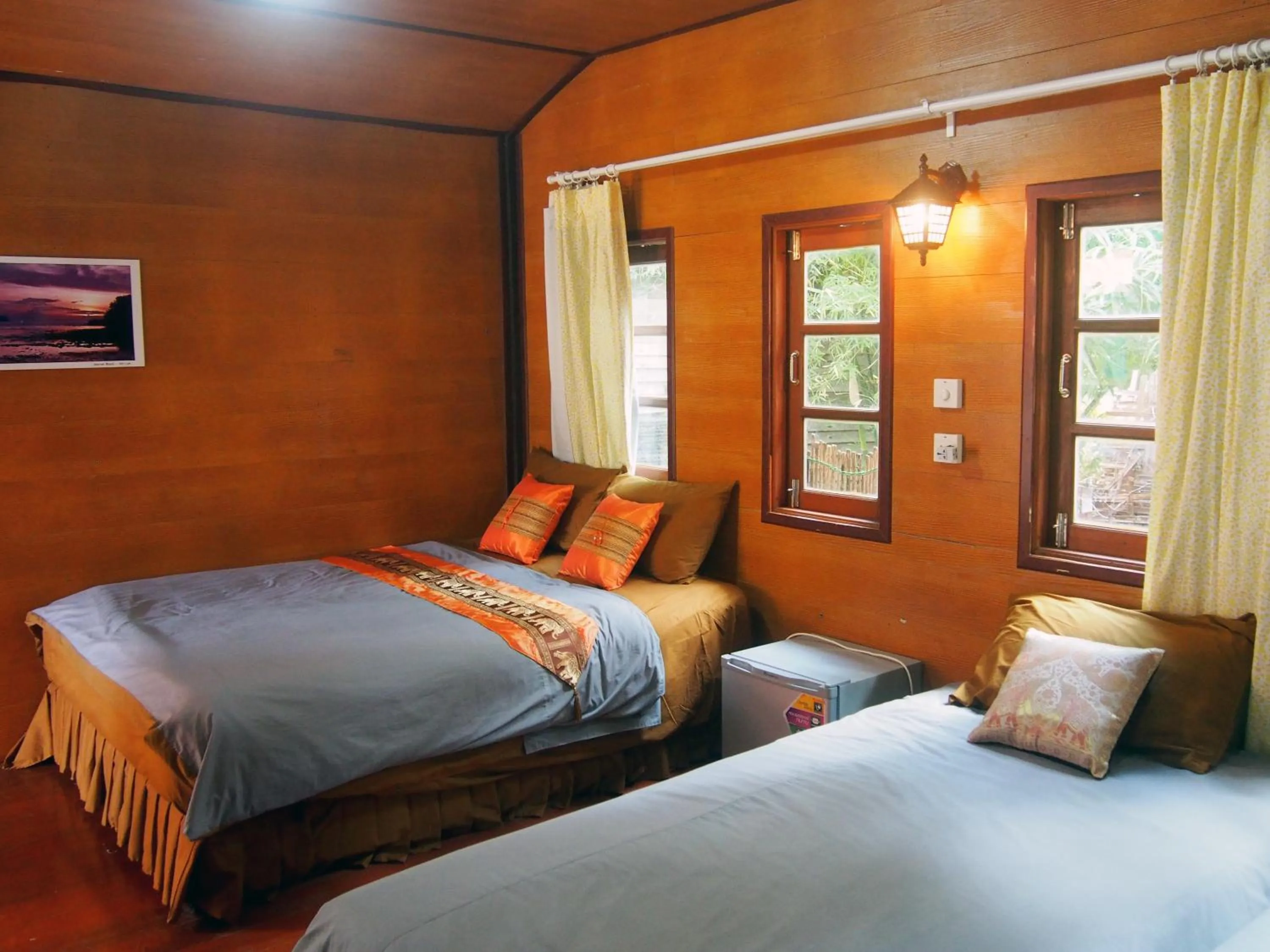 Bed in Coco Beach Bungalows
