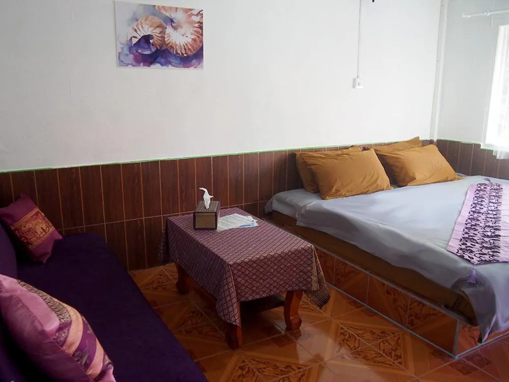 Bedroom, Bed in Coco Beach Bungalows