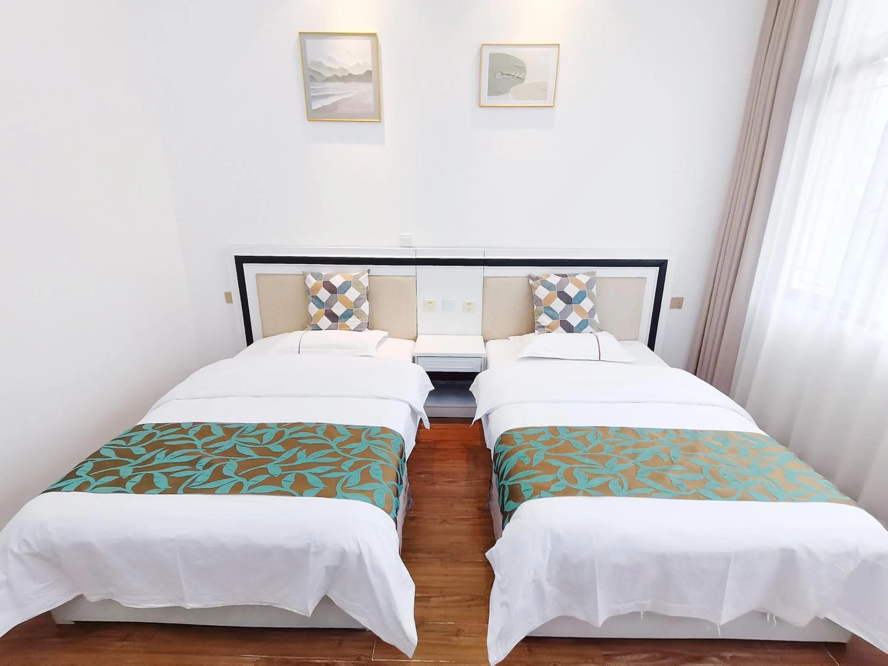 Bed in Emeishan Moon Bay Hotel