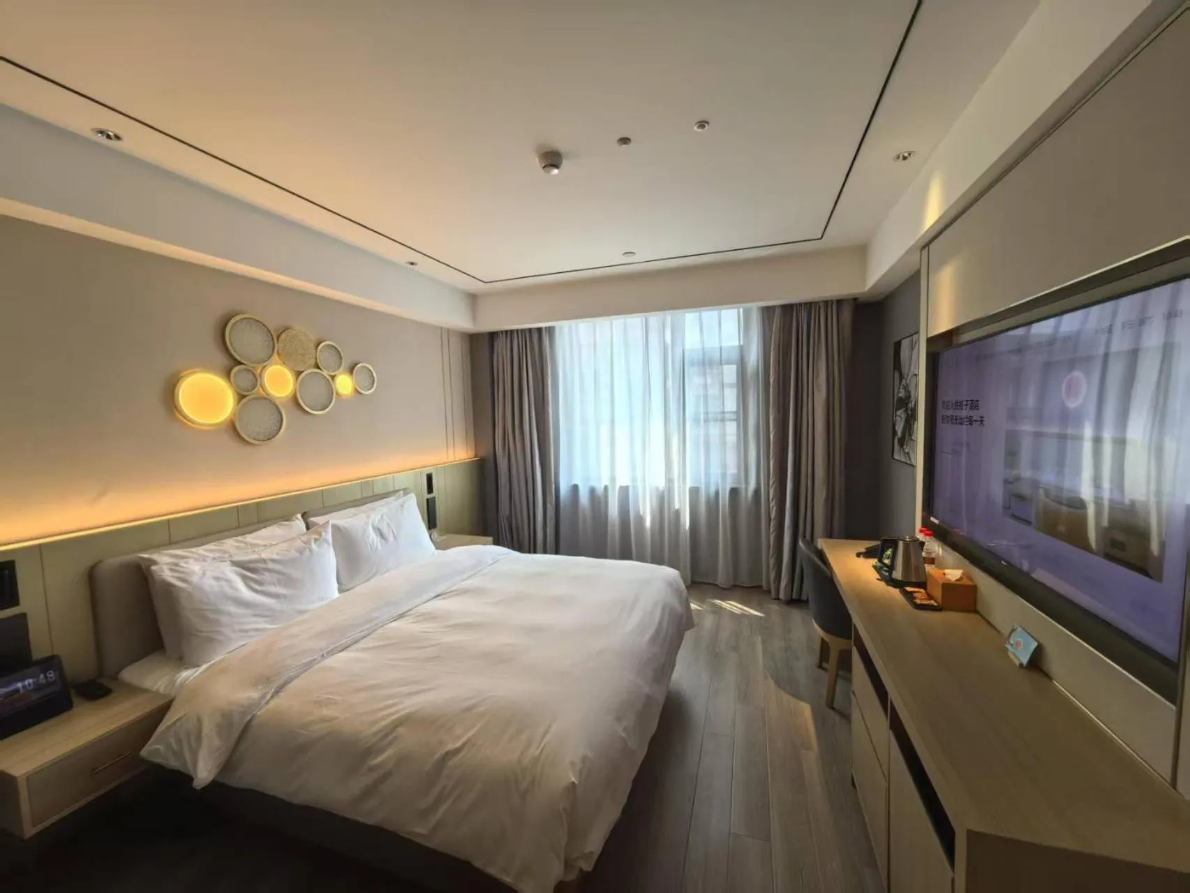 Photo of the whole room, Bed in Orange Hotel Beijing South Railway Station South Square