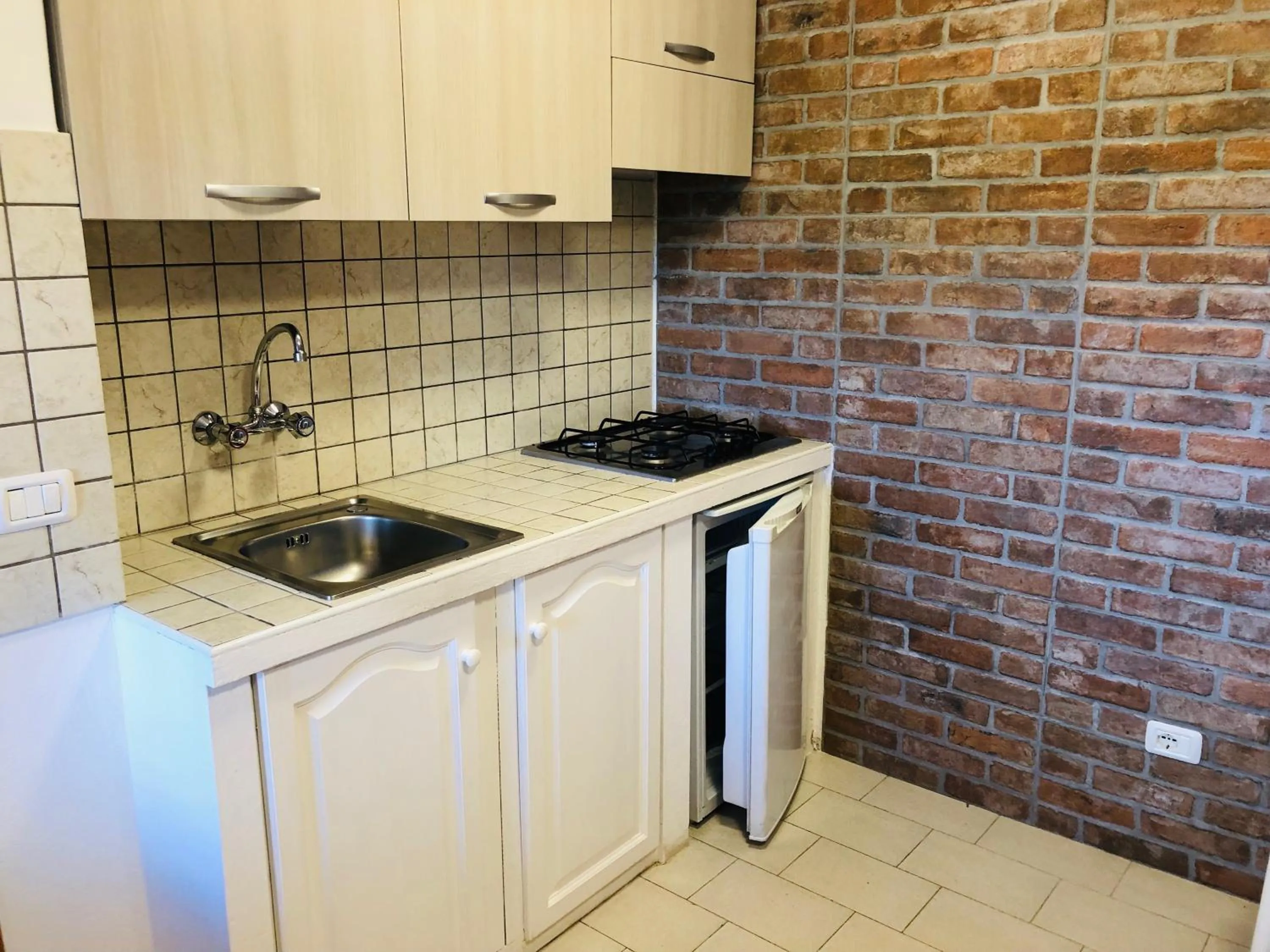 Kitchen or kitchenette in Residence La Valdana