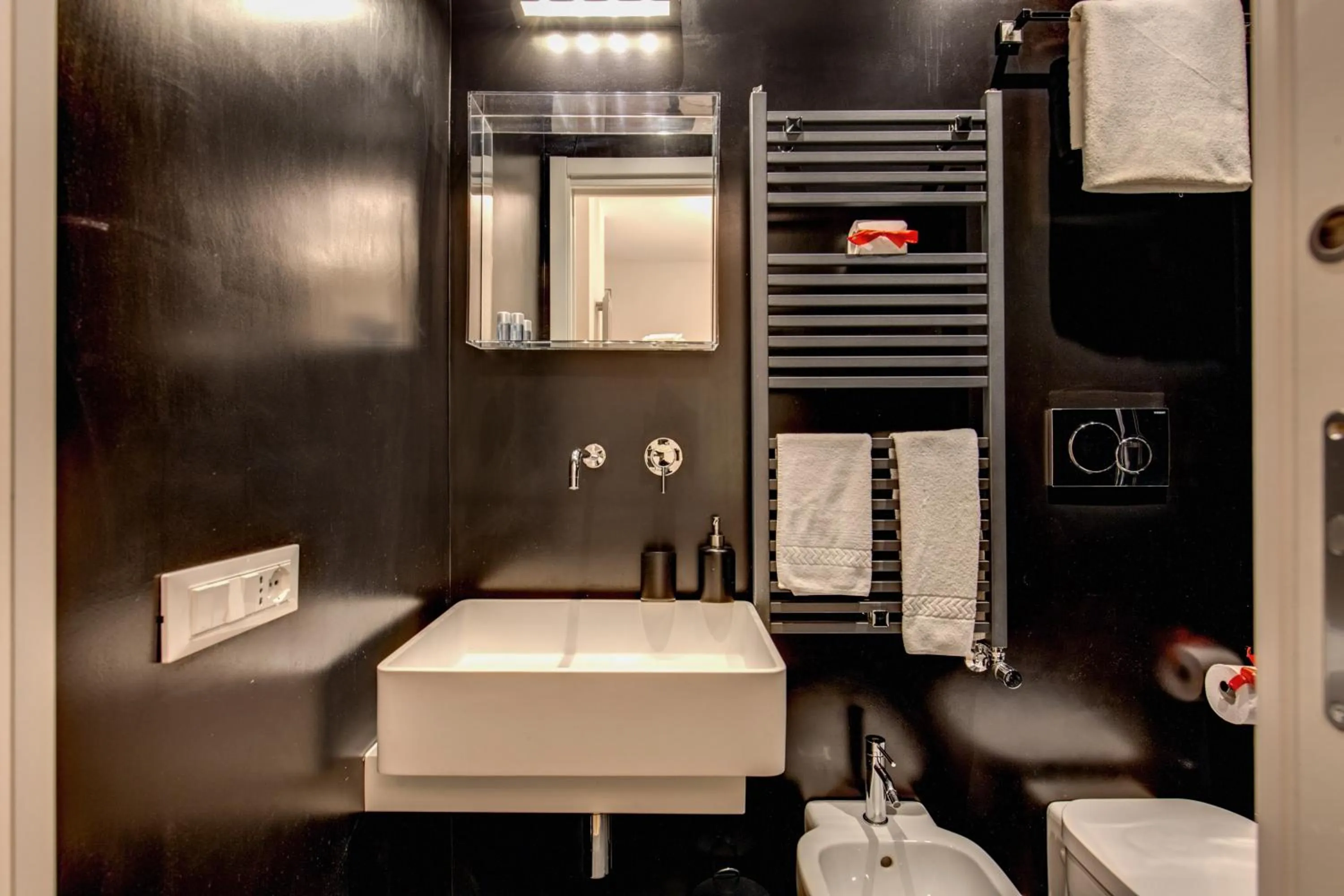 Bathroom in Orange Suites