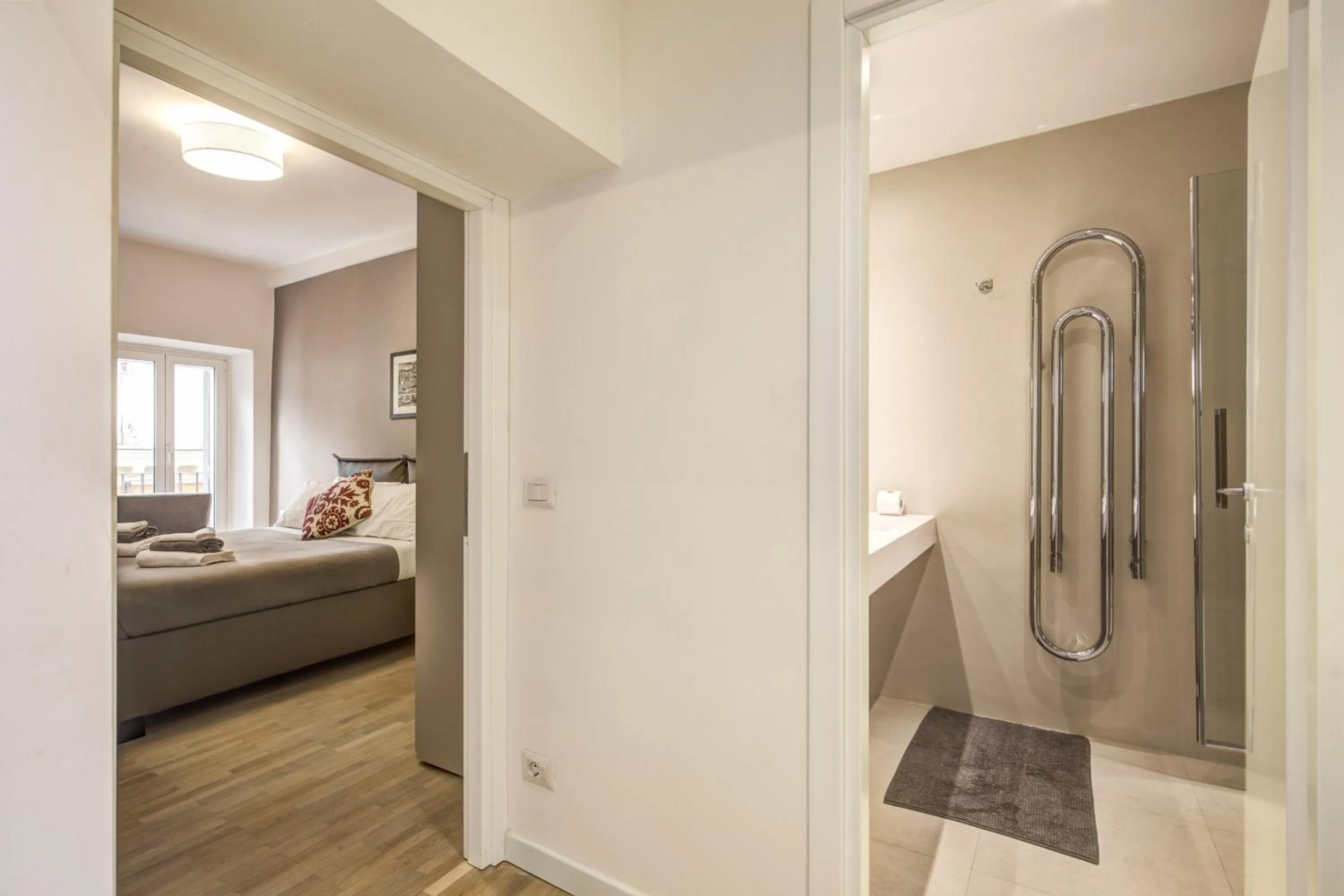 Bathroom, Bed in Orange Suites