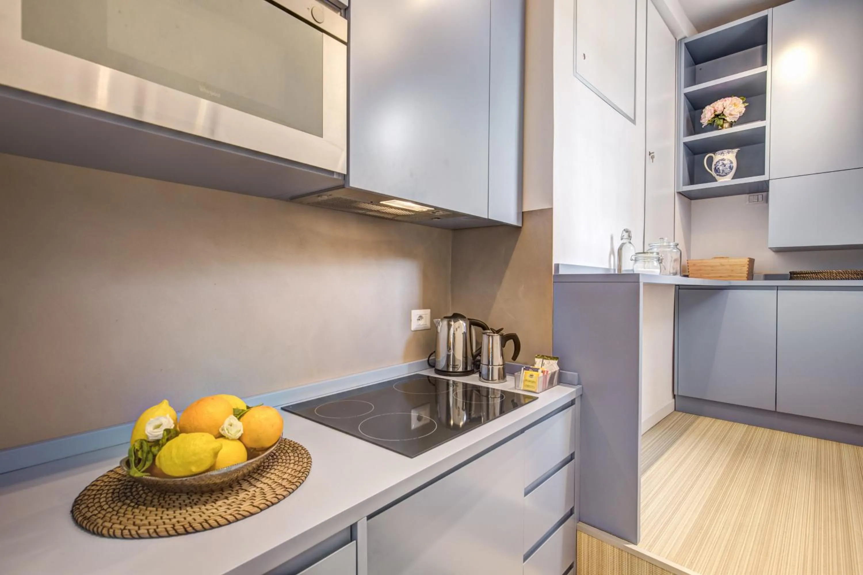 Kitchen or kitchenette in Orange Suites
