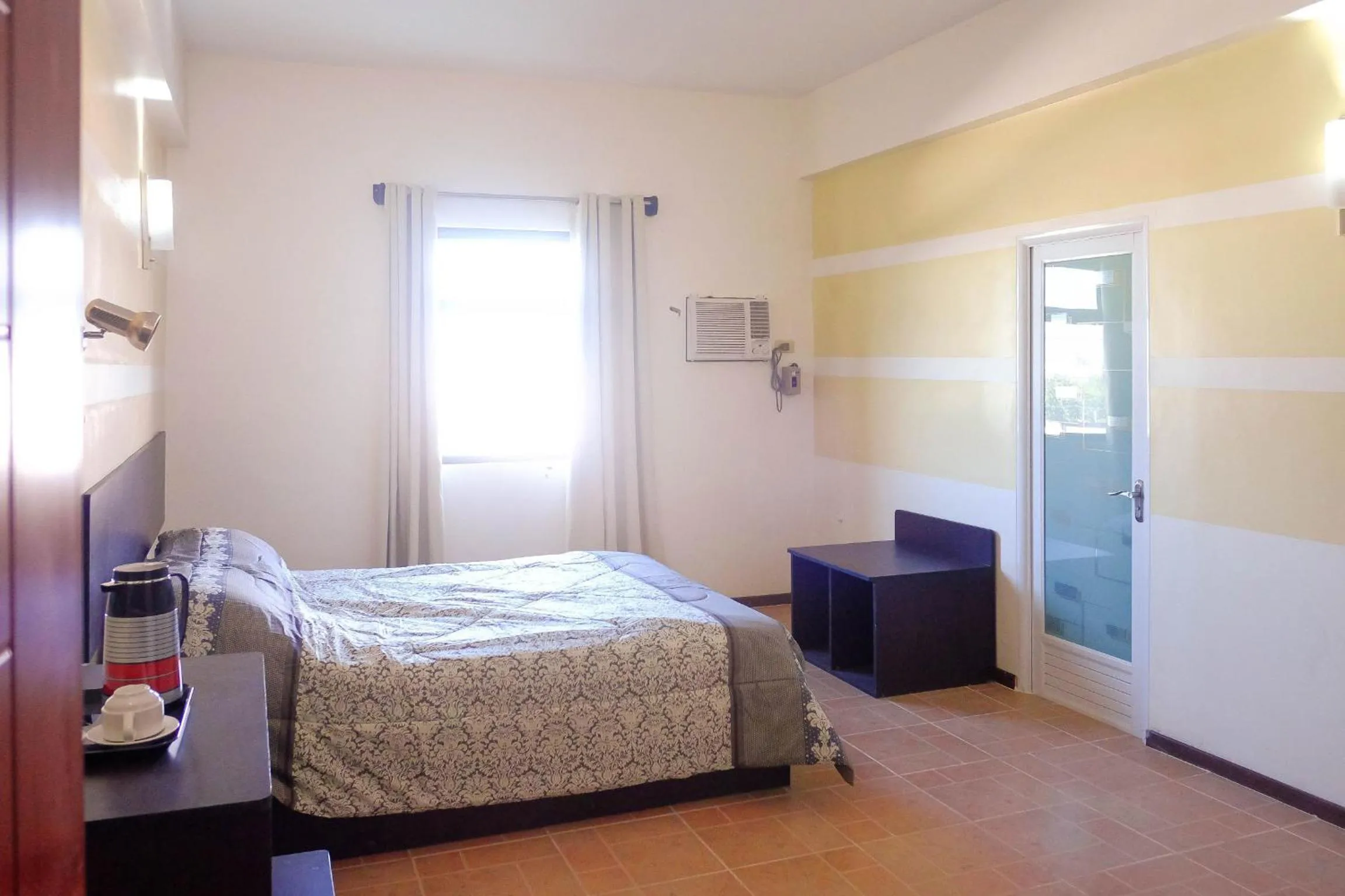 Photo of the whole room, Bed in Metro Park Hotel Mandaue