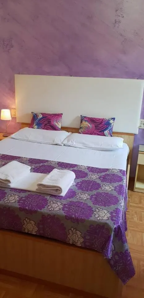 Bed in Hotel Giovannina