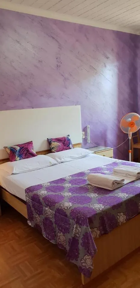 Bed in Hotel Giovannina