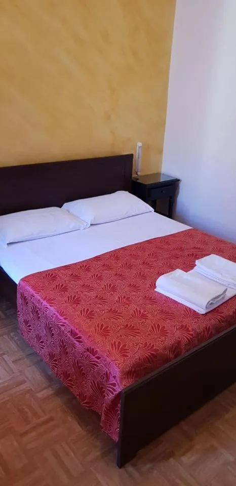 Bed in Hotel Giovannina