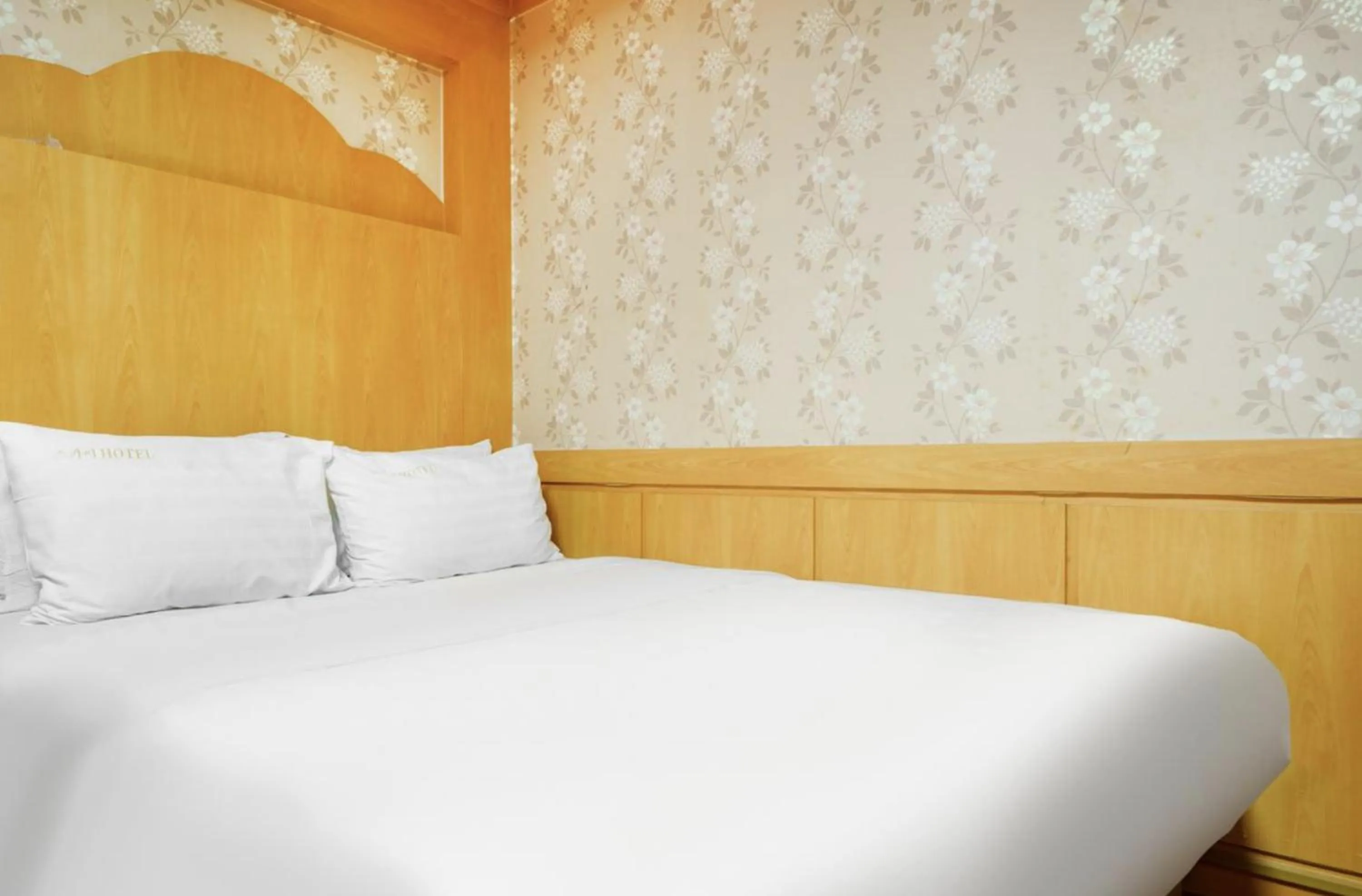 Bed in Mokpo Sky Hotel