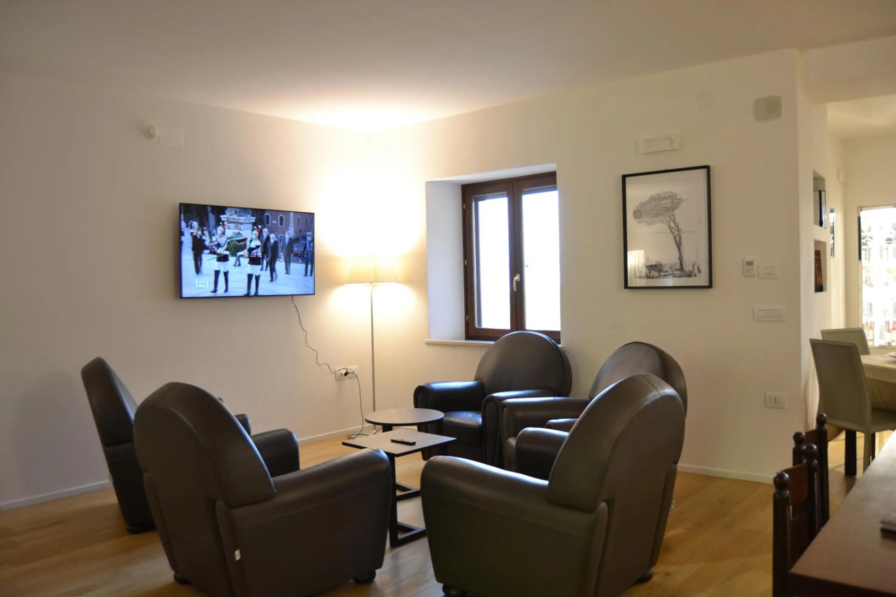 Communal lounge/ TV room in Albergo Il Rientro